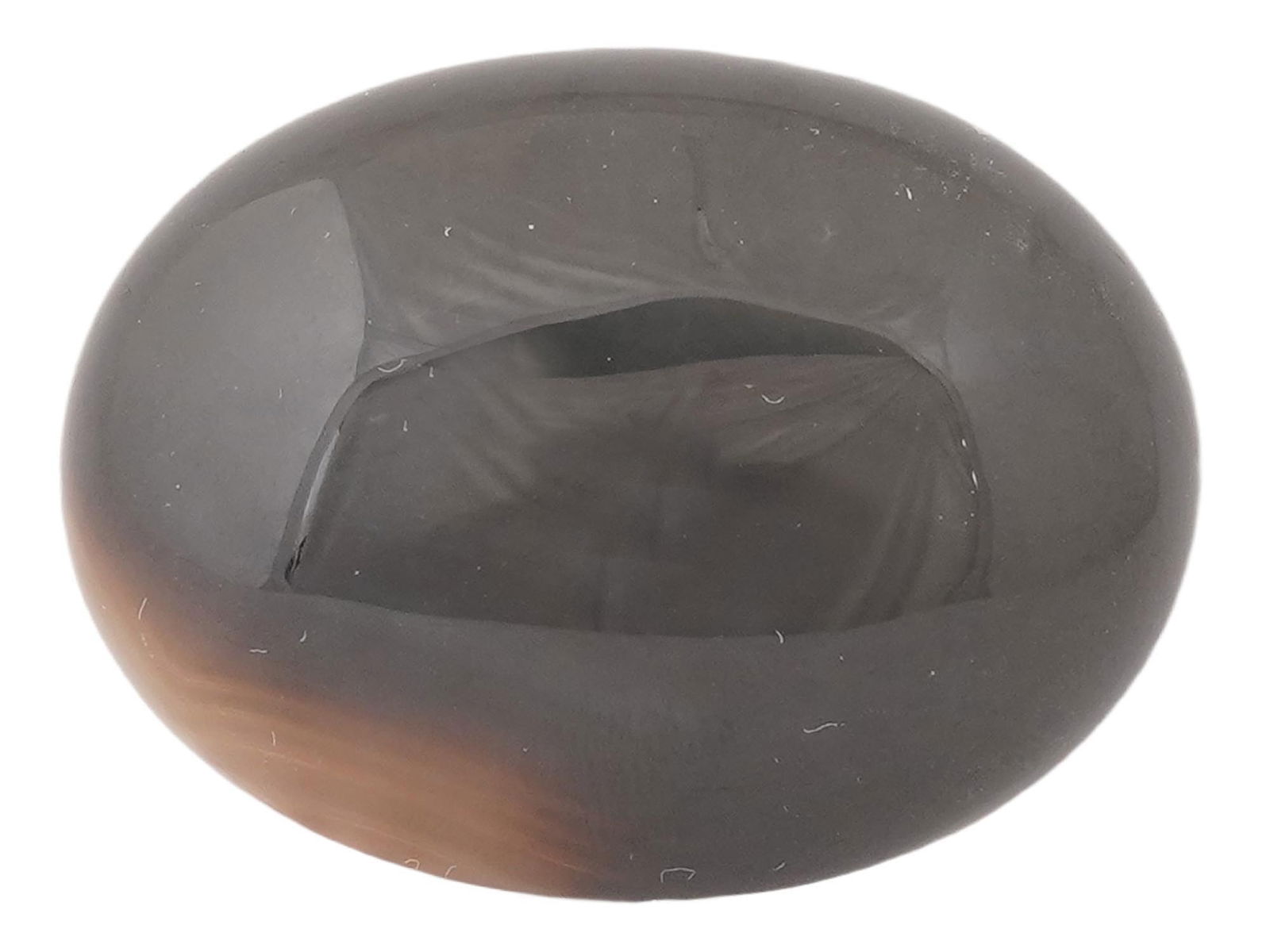 GEMSTONE HEMATITE MATERIAL FOR CARVING CAMEOS: A gemstone, likely hematite, or possibly a type of black onyx or agate, showing a traditional material for carving cameos. Hematite is particularly prized for its metallic luster, which gives carved d