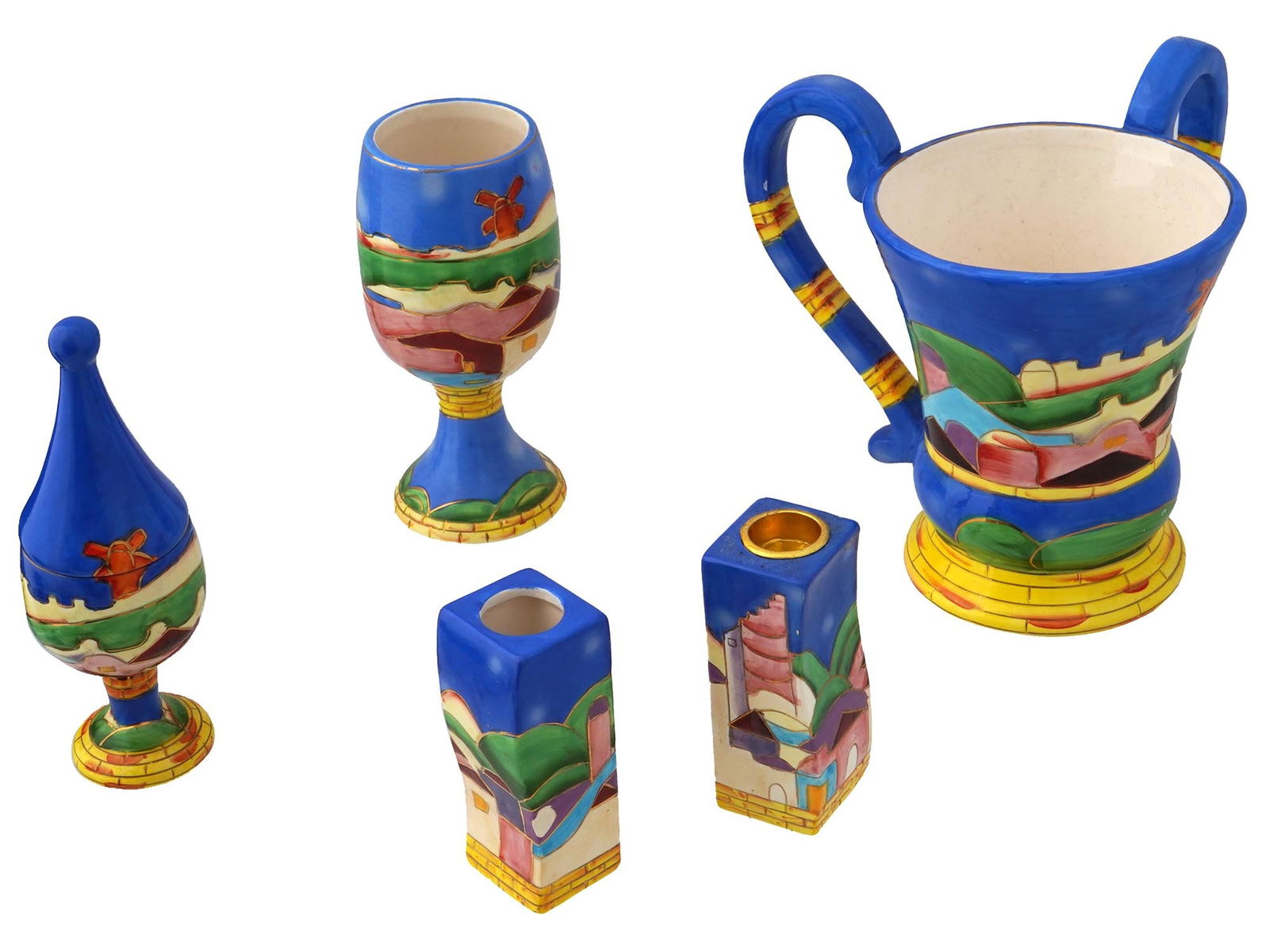 VINTAGE KARSHI JERUSALEM CERAMIC JUDAICA PIECES: A lot of 5 vintage 1980s ceramic Judaica pieces by Karshi Jerusalem. The lot includes a Kiddush cup, a washing cup, two candle holders and 1 Besamim tower. All pieces are made in the same colorful