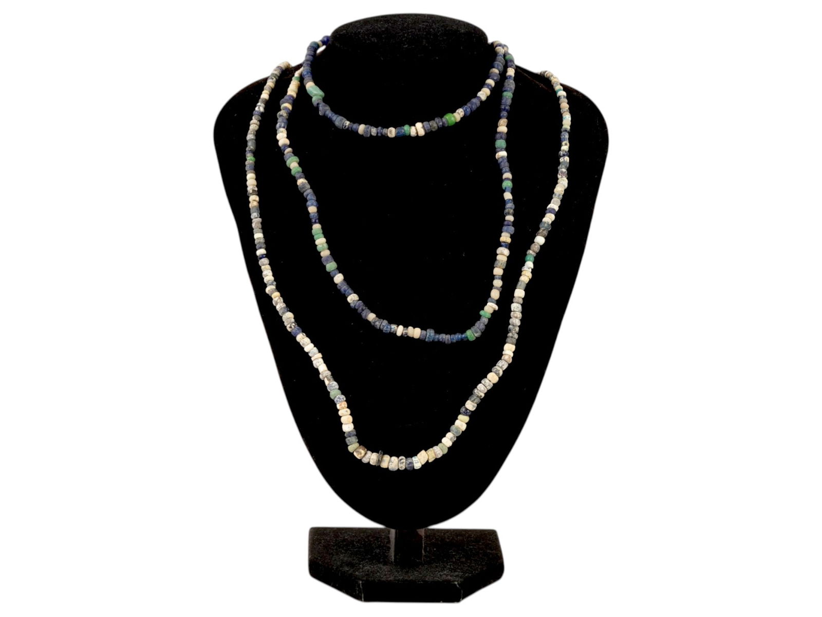 LOT OF ANCIENT ROMAN GLASS BEAD NECKLACES 100 TO 300 AD: A lot of two ancient Roman necklaces crafted from multicolored glass beads, dating from 100 to 300 AD. Each necklace showcases a range of bead colors and shapes, reflecting the Roman eras intricate gl