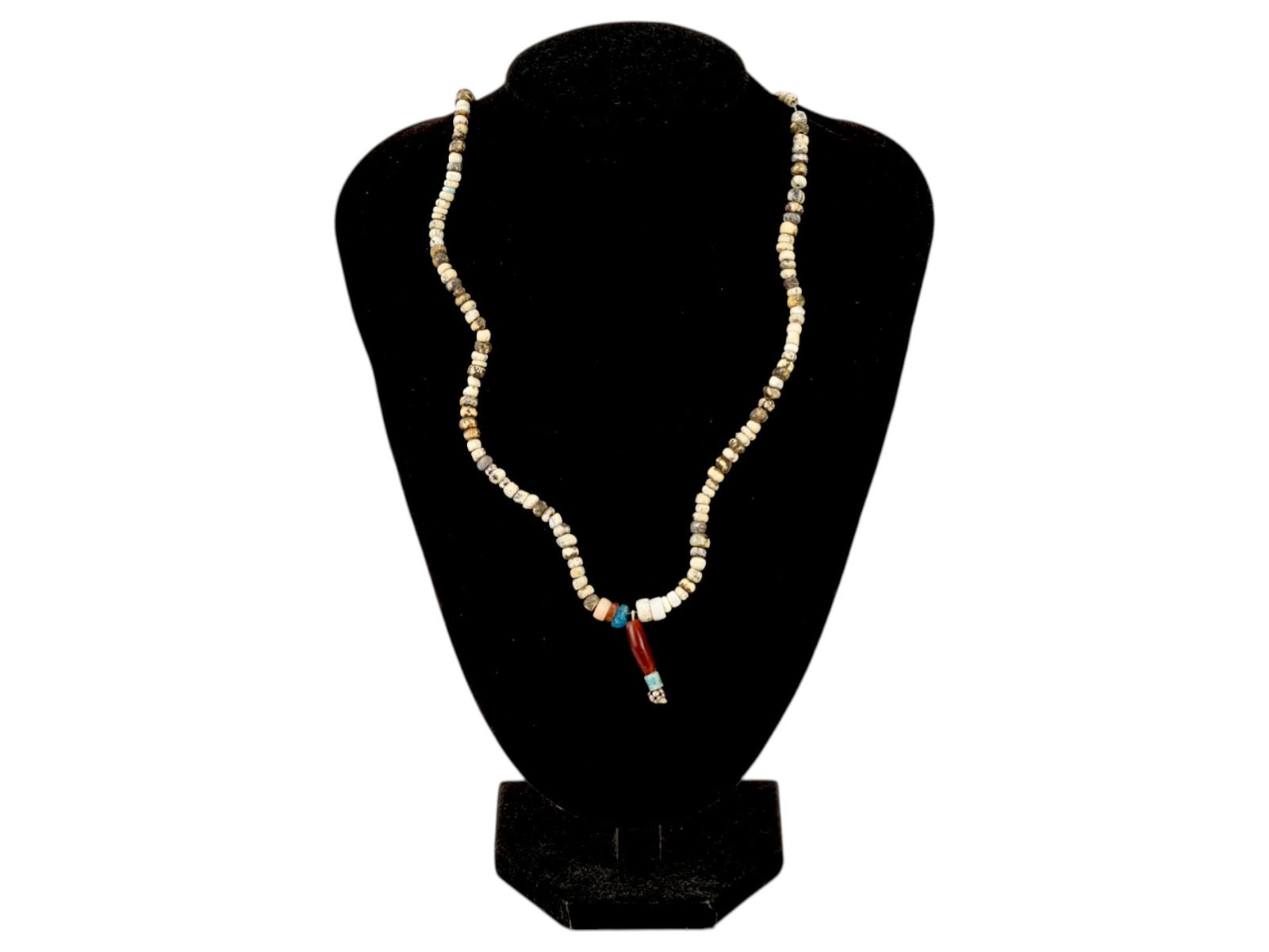 ANCIENT ROMAN GLASS STONE BEAD NECKLACE 100 TO 300 AD: An ancient Roman beaded necklace dating from 100 to 300 AD. The necklace showcases a range of bead colors, mostly circular shaped, reflecting the Roman eras intricate glasswork and appreciation for vi