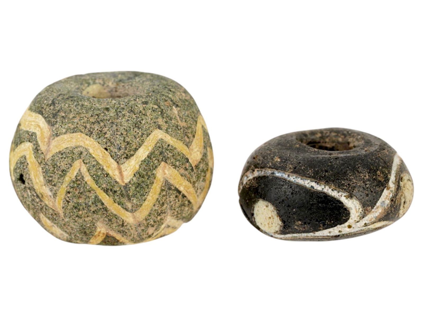 GROUP OF ANCIENT ROMAN MOSAIC BEADS 100 BC TO 200 AD: A group of two large ancient early Roman mosaic beads in various sizes. One bead is decorated with a mosaic snake design. The second bead is adorned with a mosaic design representing eyes against evil
