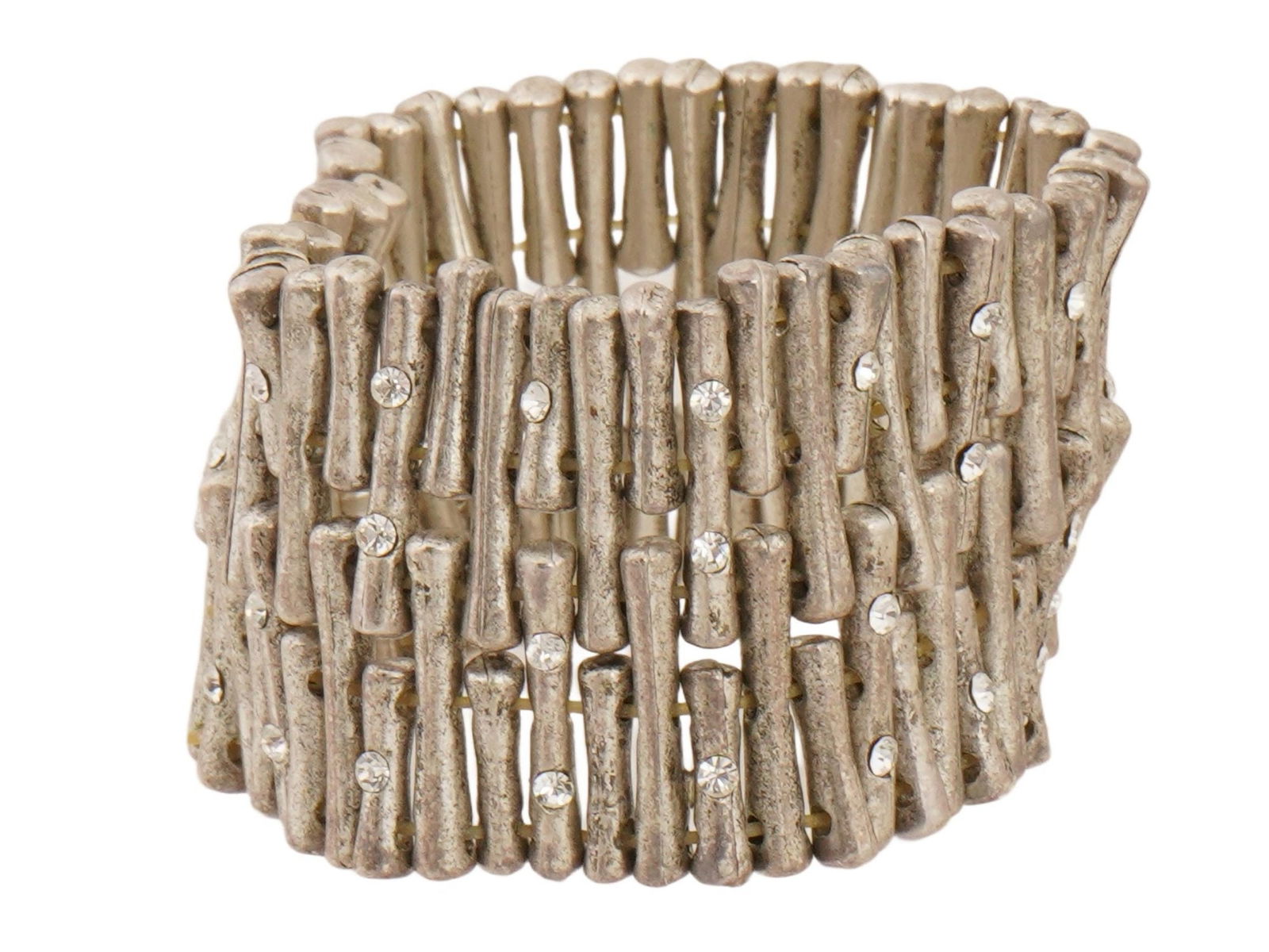 VINTAGE SILVER TONE STRETCH BRACELET BAMBOO STYLE: A vintage silver-tone stretch bracelet, featuring a textured surface that resembles sticks or branches, described as bamboo- or Meru-style. The bracelet is composed of multiple irregular, branch-like