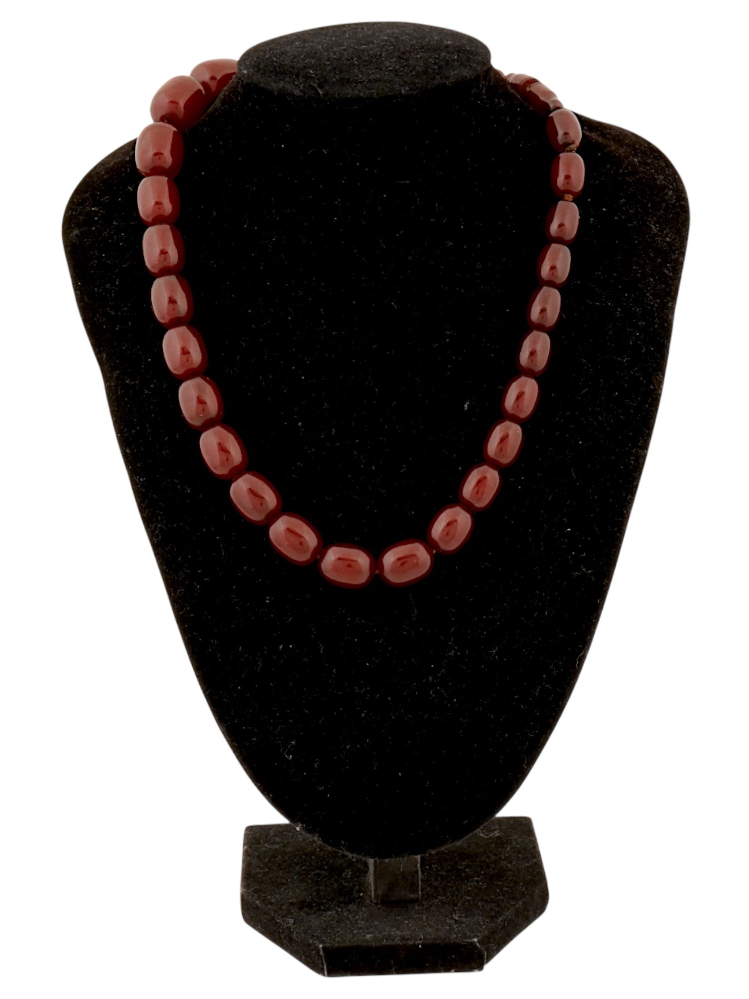 VINTAGE BARREL SHAPED BAKELITE BEADS ROSARY: A vintage bakelite also known as Faturan or imitation amber beads or rosaries. The piece is made of Bakelite, often called cherry amber due to its distinctive deep red color. The beads are oval or bar