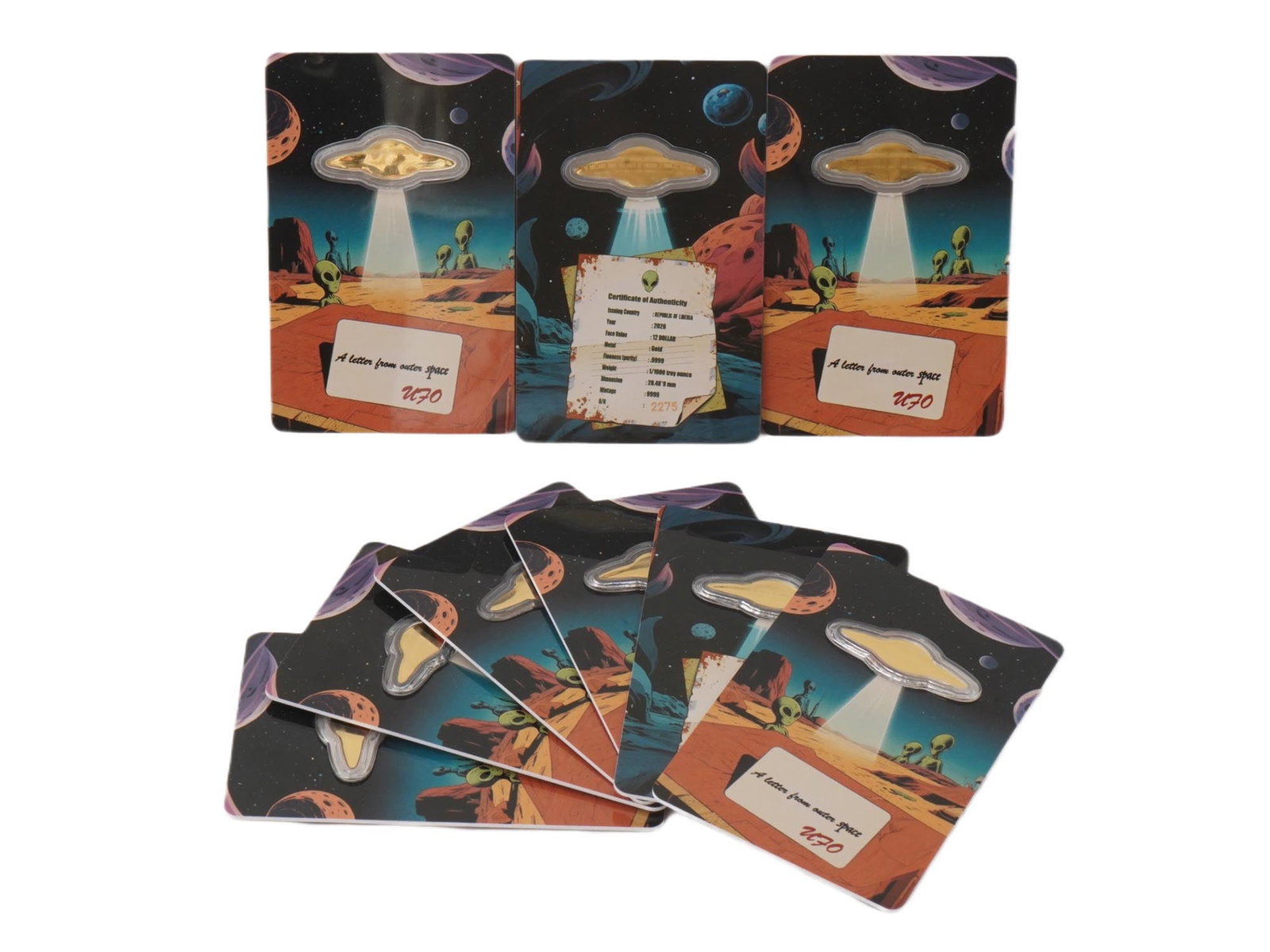 MINIATURE GOLD COINS ISSUED BY THE REPUBLIC OF LIBERIA: A group of nine miniature gold coins issued by the Republic of Liberia, each with a denomination of 12 dollars. Struck in 1 of 1000 oz of gold, the coins are encapsulated and presented in their origin