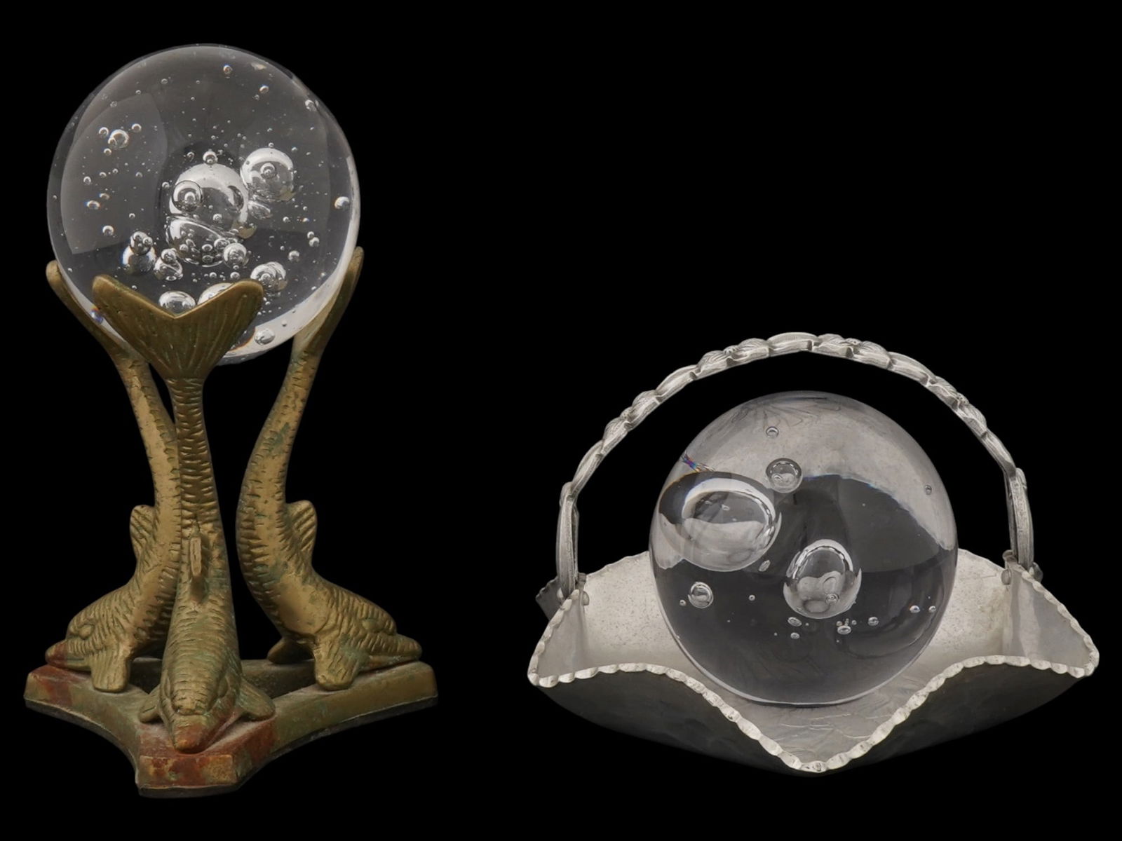 BRASS DOLPHIN TRIPOD 2 PAPERWEIGHTS RODNEY KENT BASKET: A vintage brass dolphin shaped tripod with a clear glass bubble globe paperweight and a Rodney Kent metal basket bowl with the same designed paperweight. Vintage and Modern Paperweights and Glassware