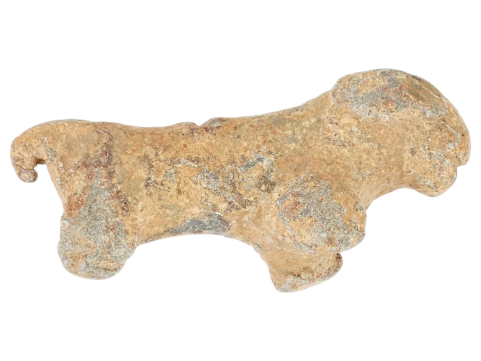 ANCIENT HOLY LAND LEAD DOG FIGURINE 1ST MILLENNIUM BC: An ancient Holy land lead figurine of a dog. Circa 1st millennium BC. The figurine represents the elongated body of a dog with a large head and a short tail. Ancient Sculptures And Collectibles.