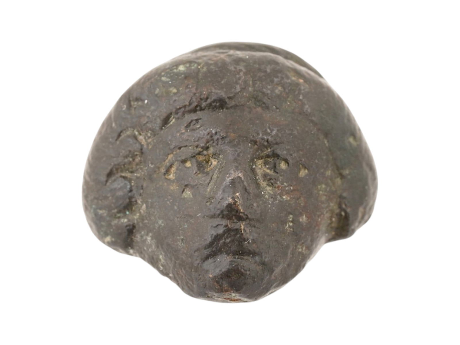 ANCIENT ROMAN BRONZE HEAD DATING TO 100 TO 300 AD: An ancient Roman bronze head dating to approximately 100 to 300 AD. The sculpture presents a fragment of a human head. Ancient Artifacts And Historical Collectibles. THIS LOT IS ELIGIBLE FOR A