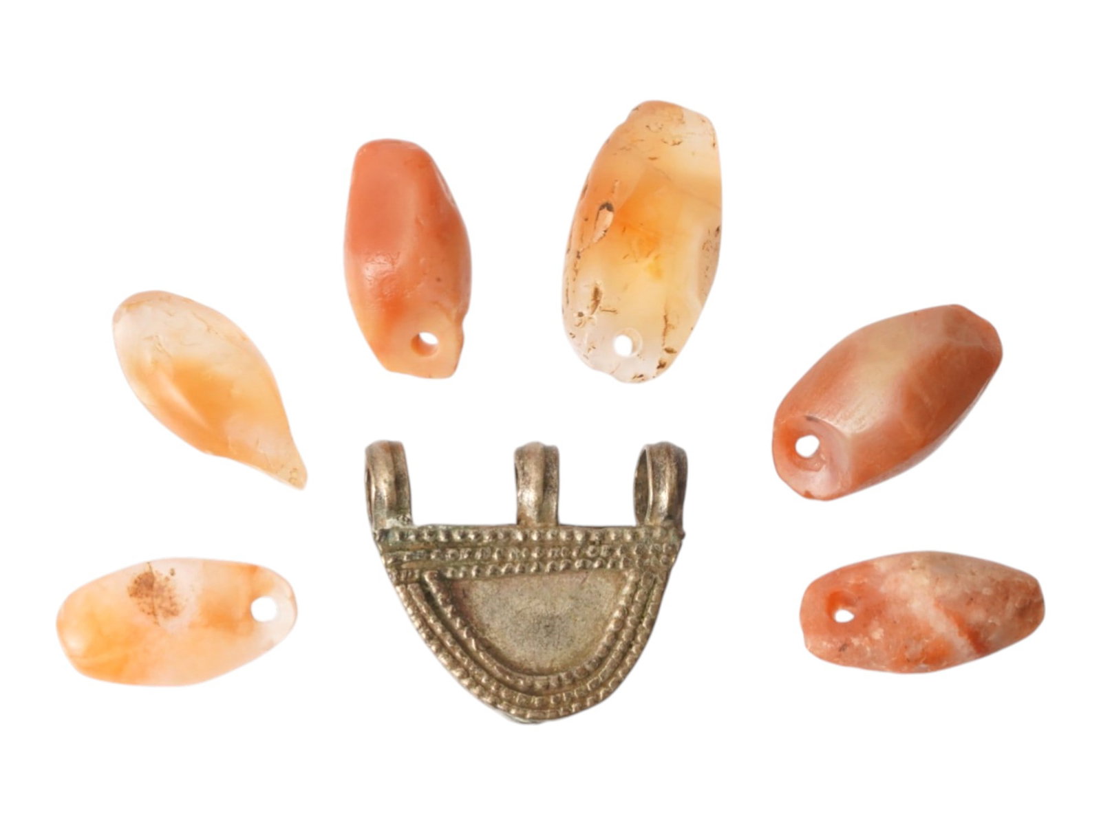 GROUP OF ANCIENT HOLY LAND AGATE AND SILVER PENDANTS: A group of ancient agate and silver pendants originating from the Holy Land and dating to the 1st millennium BC. The pendants feature agate stones and a silver element. Ancient Artifacts And Historica