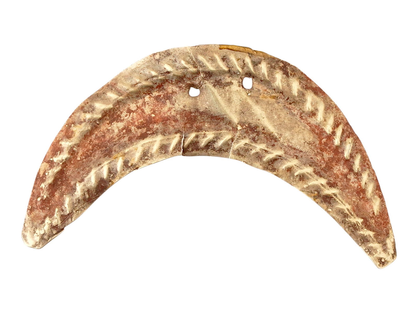 ANCIENT ROMAN GOLD CRESCENT PENDANT 100 TO 300 AD: An ancient Roman gold jewelry pendant. The ware features a minimalistic design of a voluminous crescent shape, and decorated with two openings. Circa: 100 to 300 AD. Ancient Goldware And Jewelry Colle