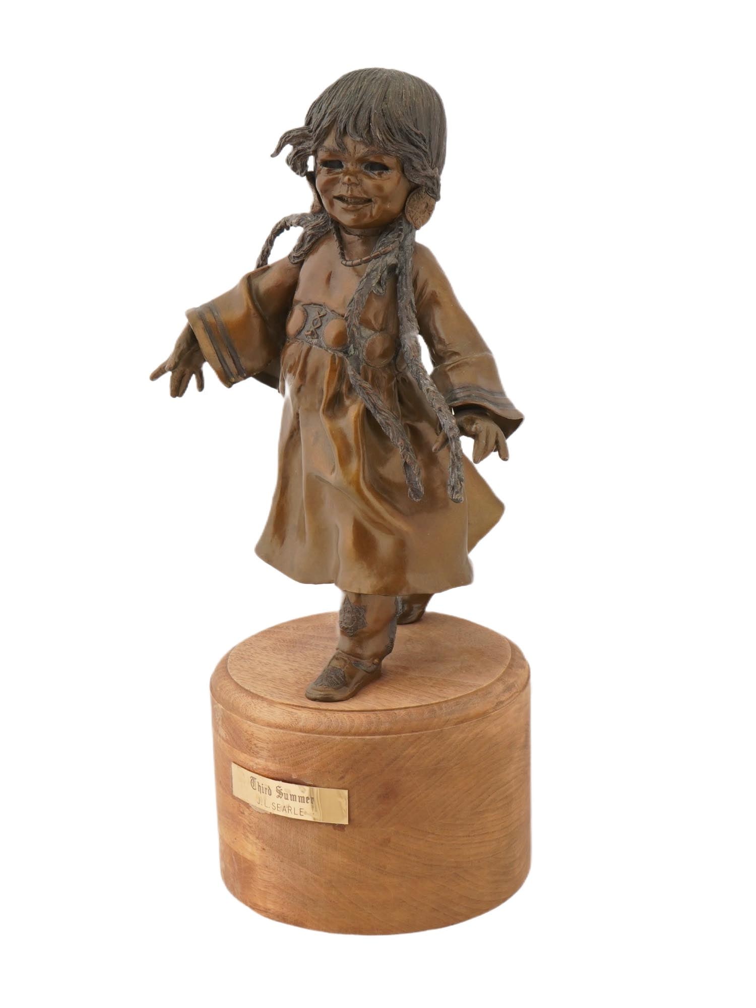 LTD AMERICAN BRONZE SCULPTURE BY J L SEARLE SIGNED: Jan L. Searle, American, born 1938, a limited edition patinated bronze sculpture, Third Summer, depicting a young girl dancing. Signed with casting, numbered 3 of 12, dated 79, on the sculpture. Mount