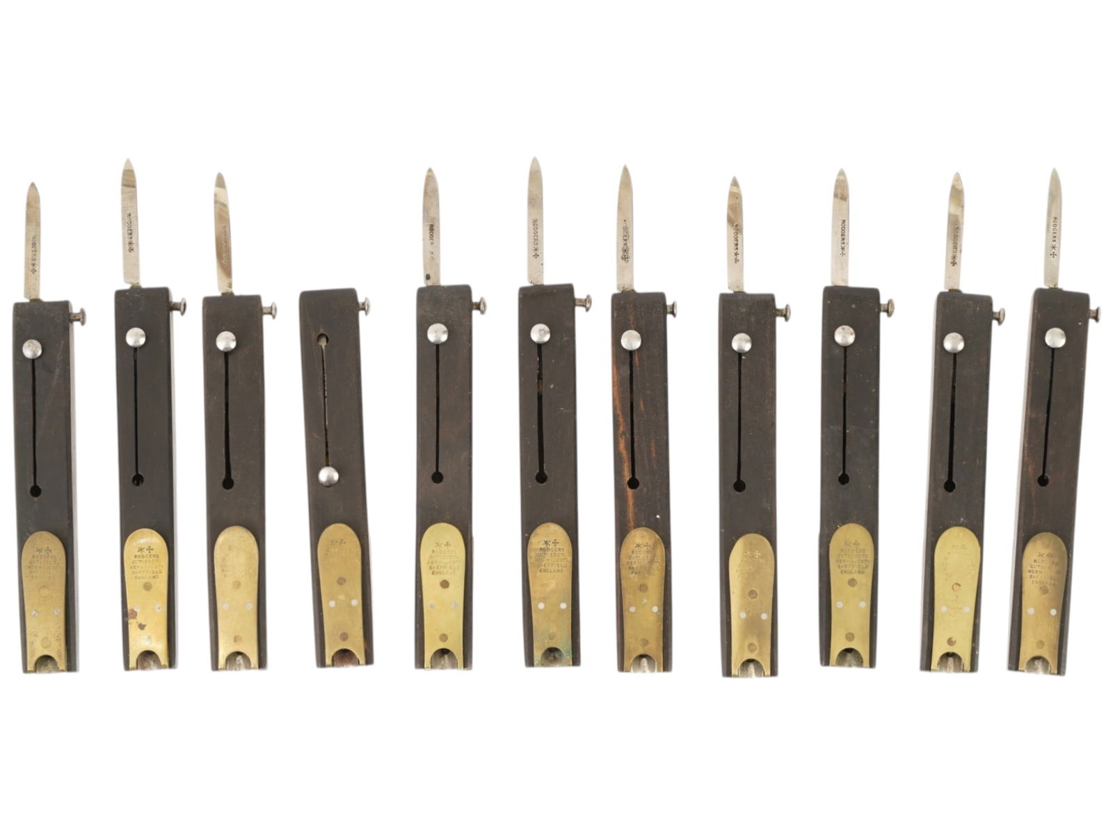 ANTIQUE VICTORIAN RODGERS MECHANICAL QUILL CUTTERS: A group of 11 antique Victorian mechanical quill cutters made by Joseph Rodgers and Sons of Sheffield, England, one of the most prestigious English cutlery firms and royal cutlers from the 19th centur