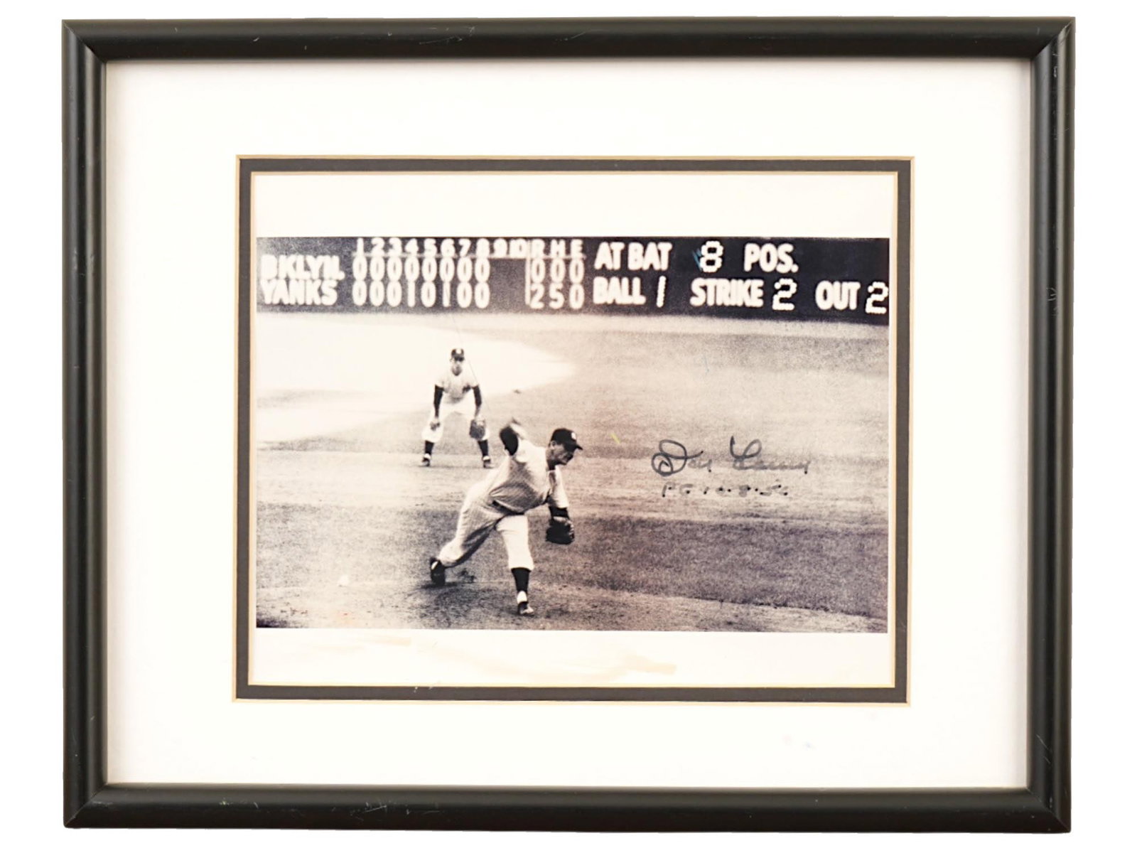 DON LARSEN PERFECT GAME AUTOGRAPHED PHOTO: A historic black and white photograph signed by Don Larsen, commemorating his 1956 World Series perfect game. The signature is clean and well-preserved on this iconic baseball image. Perfect Game,