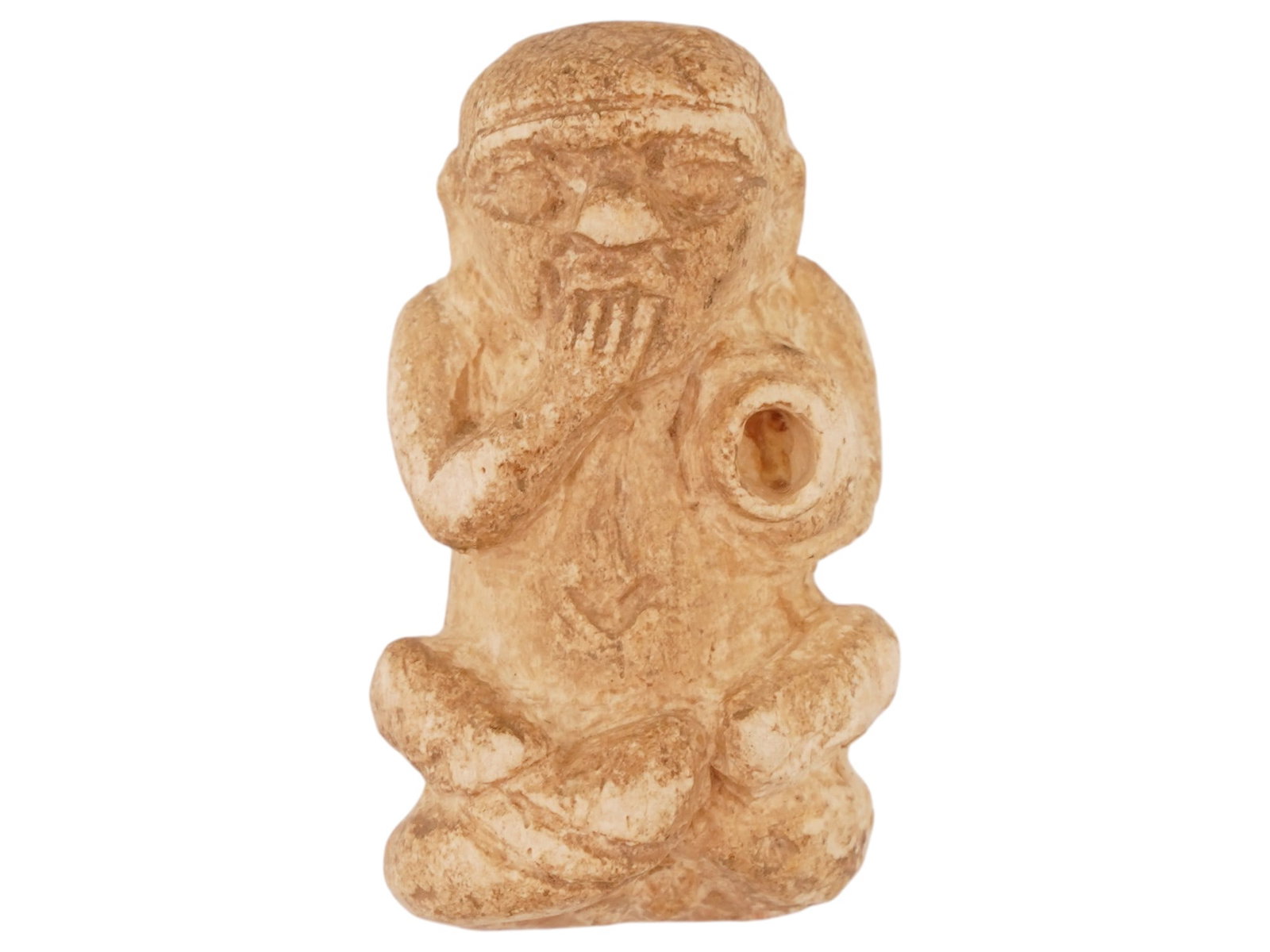 ANCIENT EGYPTIAN CARVED STONE PATAIKOS EROTIC PENDANT: An ancient Egyptian hand carved soft stone erotic amulet pendant dating to the Late Period, circa 700 to 200 BC. Features Pataikos sitting on his phallus. He is an Egyptian genius or deity represented