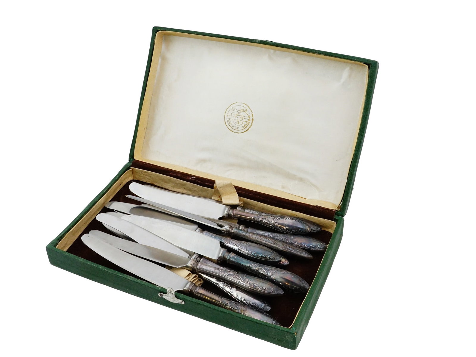 VINTAGE RUSSIAN SOVIET SILVER PLATED 12 KNIVES SET: A vintage Russian Soviet silver plated and stainless steel cutlery set, including 12 dessert knives, from Olenegorsk Mechanical Plant. Circa 1980s to 1990s. The handles of all pieces in the set are de