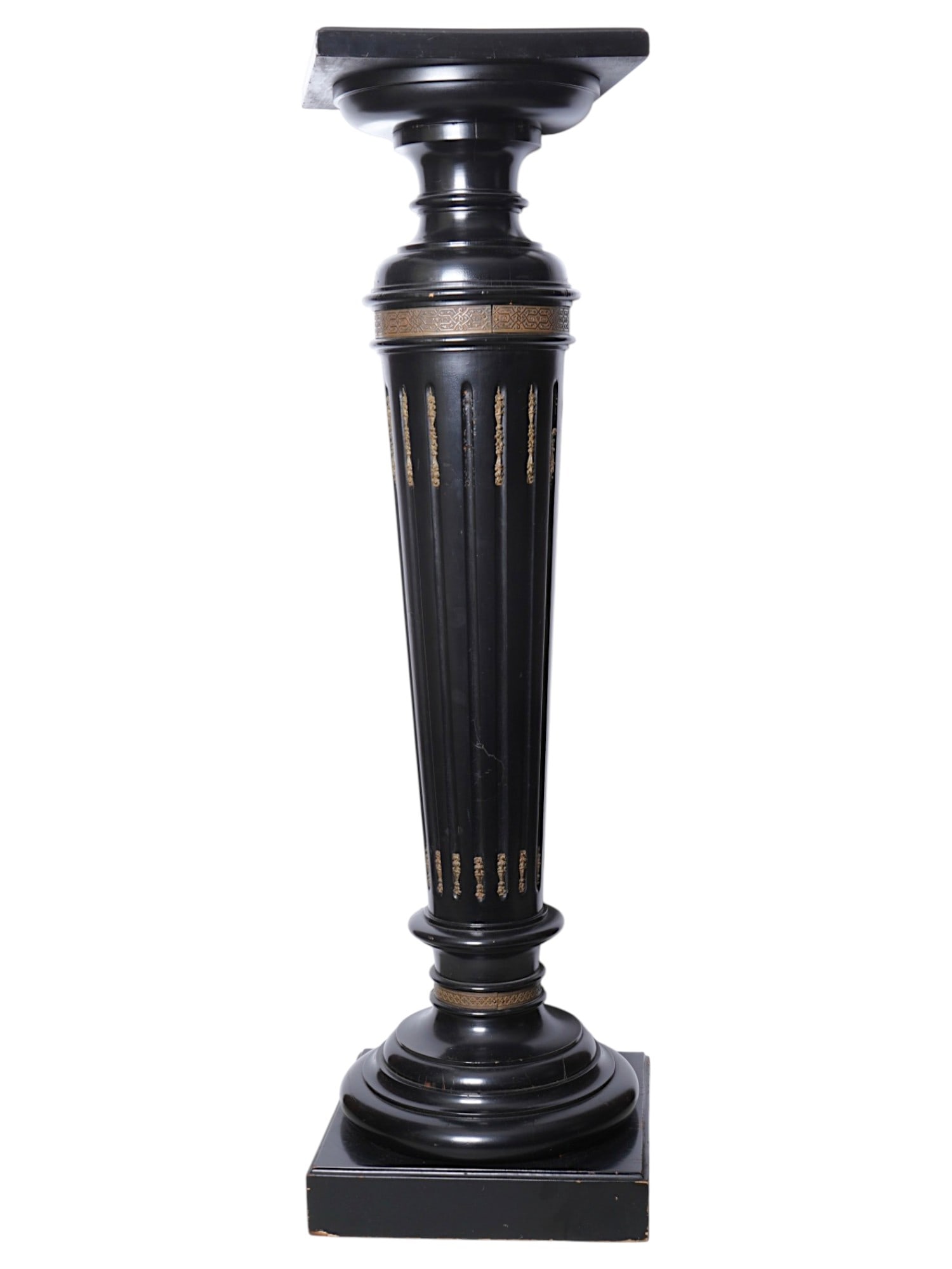 ANTIQUE VICTORIAN WOOD PEDESTAL WITH BRASS INLAYS: An antique Victorian painted black and varnished wood pedestal. Circa 19th to early 20th century. Modeled after a column with a flat top, it features patterned brass inlays. Designed for displaying ar