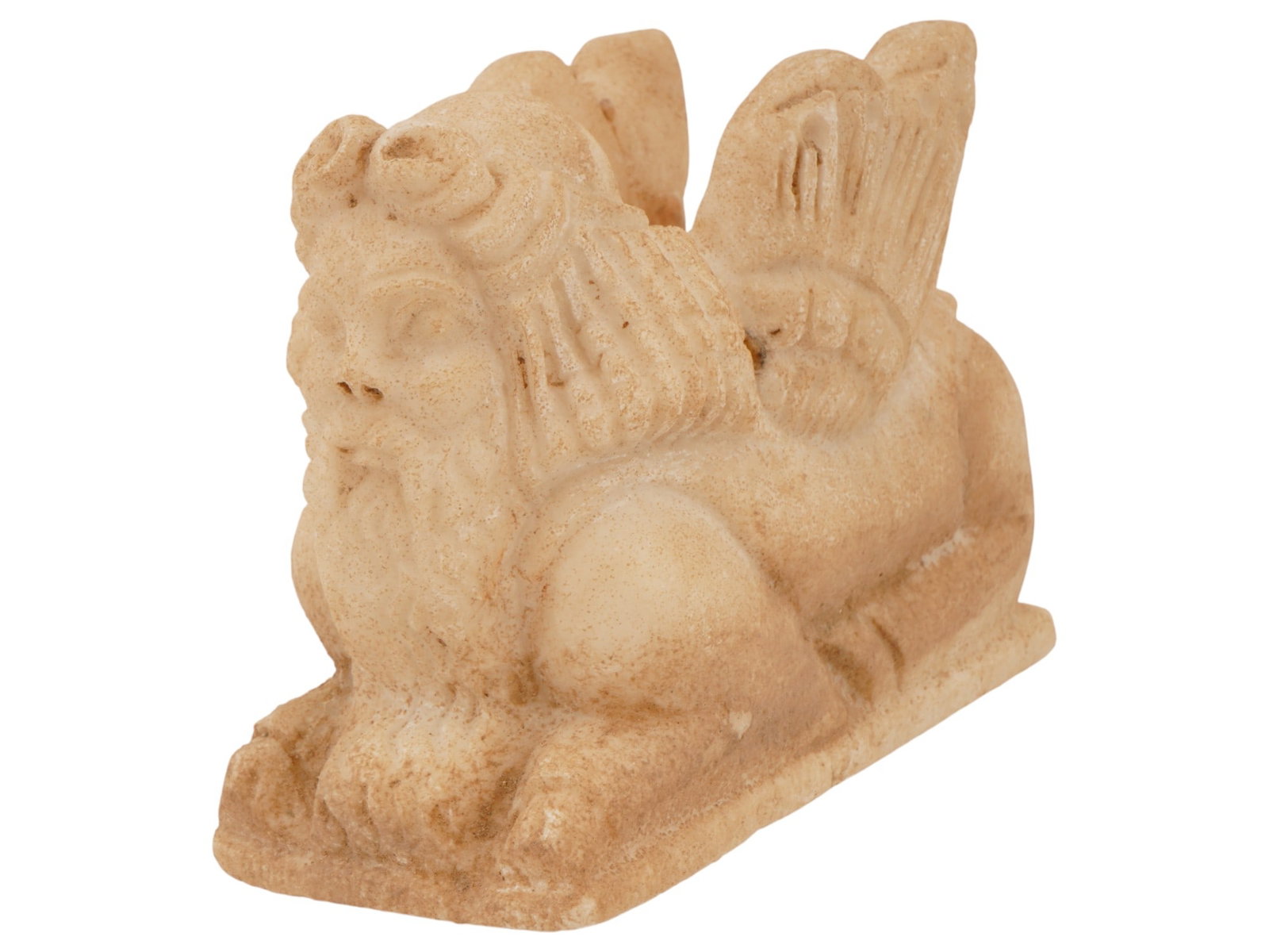 ANCIENT WESTERN ASIAN CARVED MARBLE SPHINX FIGURINE: An ancient Western Asian carved marble figurine depicting a mythological sphinx, dating to the 2nd to 1st millennium BC. The sphinx, a hybrid creature combining human and animal elements, held protect