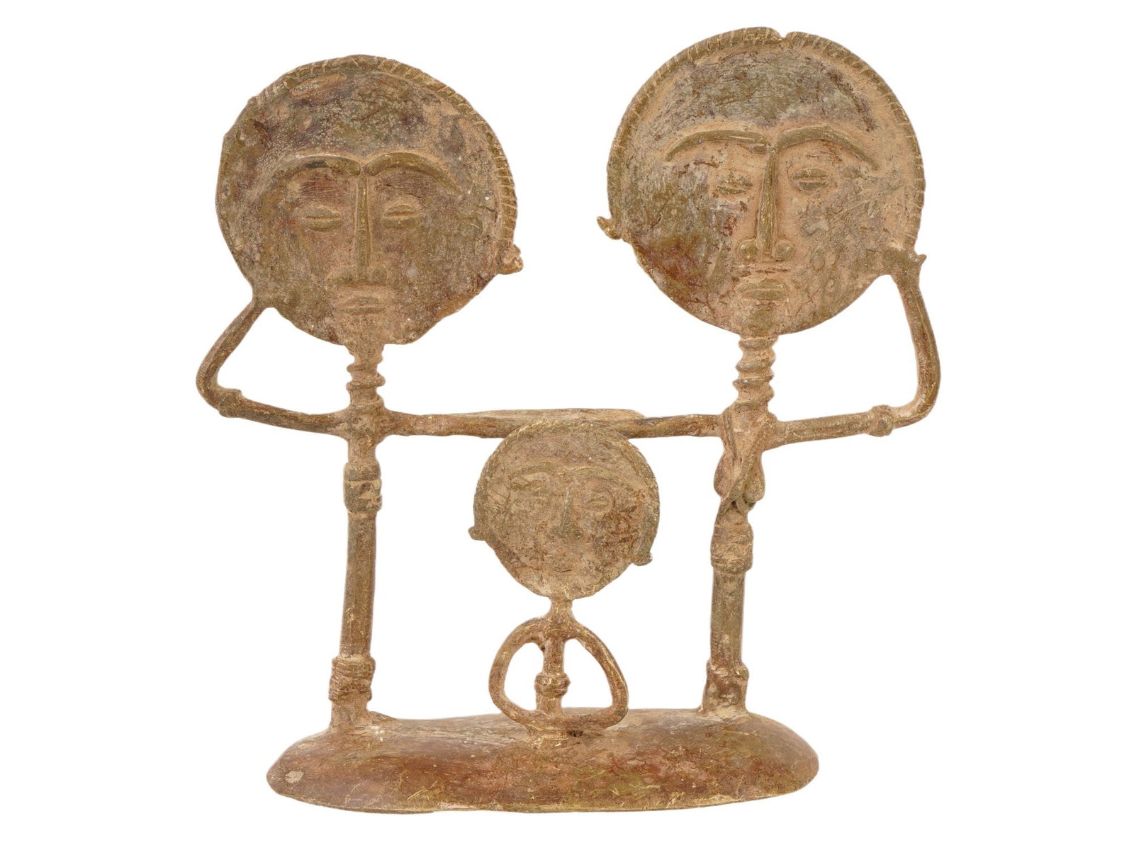 WEST AFRICAN GHANA ASHANTI FERTILITY METAL SCULPTURE: A West African Ghana Ashanti Fertility metal sculpture. The sculpture depicts a family of three people - two adult figures and a child between them, standing on a common base. The Asante, also known a