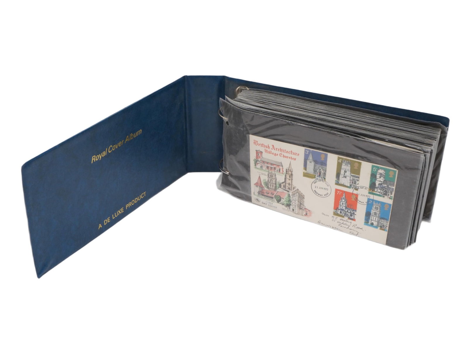 FIRST DAY OF ISSUE STAMPED POSTAL ENVELOPES W BINDER: A large lot of stamped postal envelopes, including the first day of issue, collected in a hardcover binder. Circa the mid- to late 20th century. Most of the envelopes feature postage stamps of various