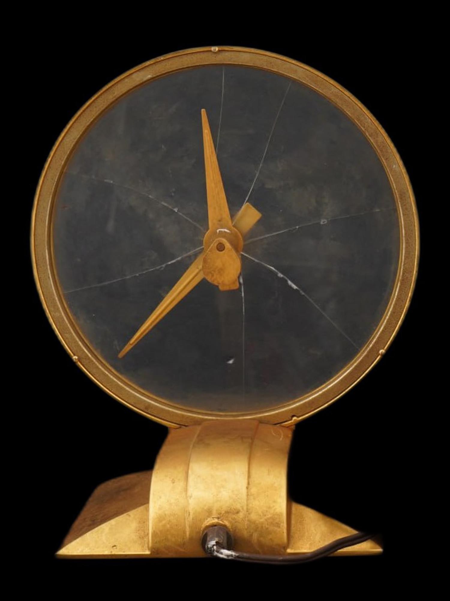 VINTAGE JEFFERSON GOLDEN HOUR ELECTRIC MYSTERY CLOCK: A vintage American Jefferson Golden Hour Electric Mystery clock, a celebrated icon of Mid-Century Modern design. First introduced in 1949 by the Jefferson Electric Company of Bellwood, Illinois, it re