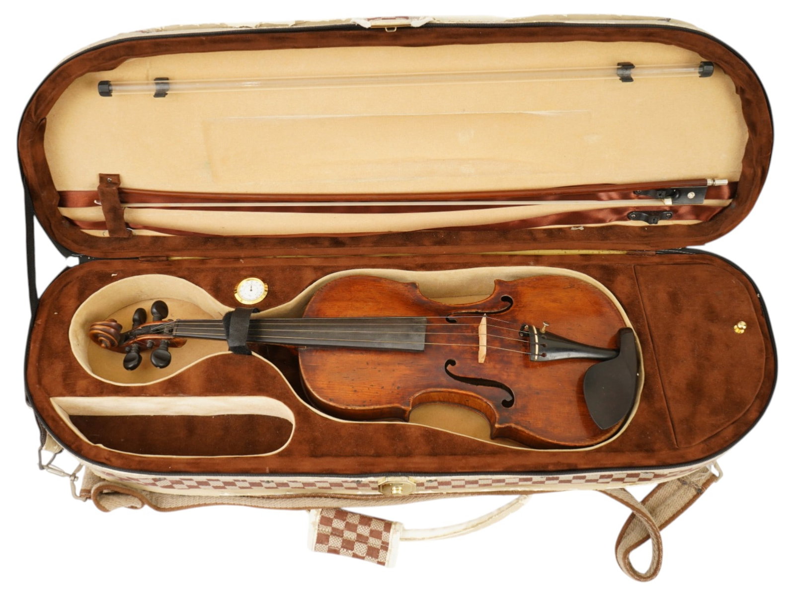 VINTAGE VIOLIN WITH A BOW IN A FITTED CASE: A violin featuring a musical instrument designed for intermediate to advanced players. Hand-carved from solid tonewoods, it features a spruce top, flamed maple back and sides, and ebony fittings, fini