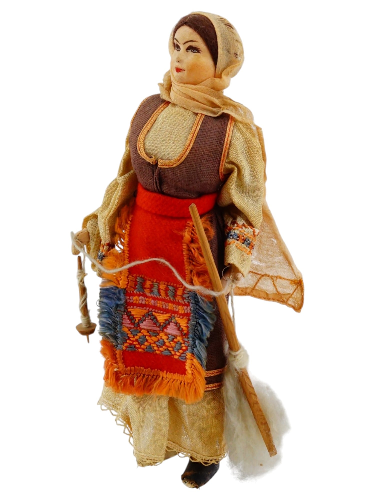 FOLK ART GREEK ATTICA TRADITIONAL COSTUME DOLL: A vintage collectible doll in Greek folk costume. The doll is dressed in traditional womens clothing typical of Attica, Greece. Made of fabric and wood, with painted linen faces. The doll holds tradit