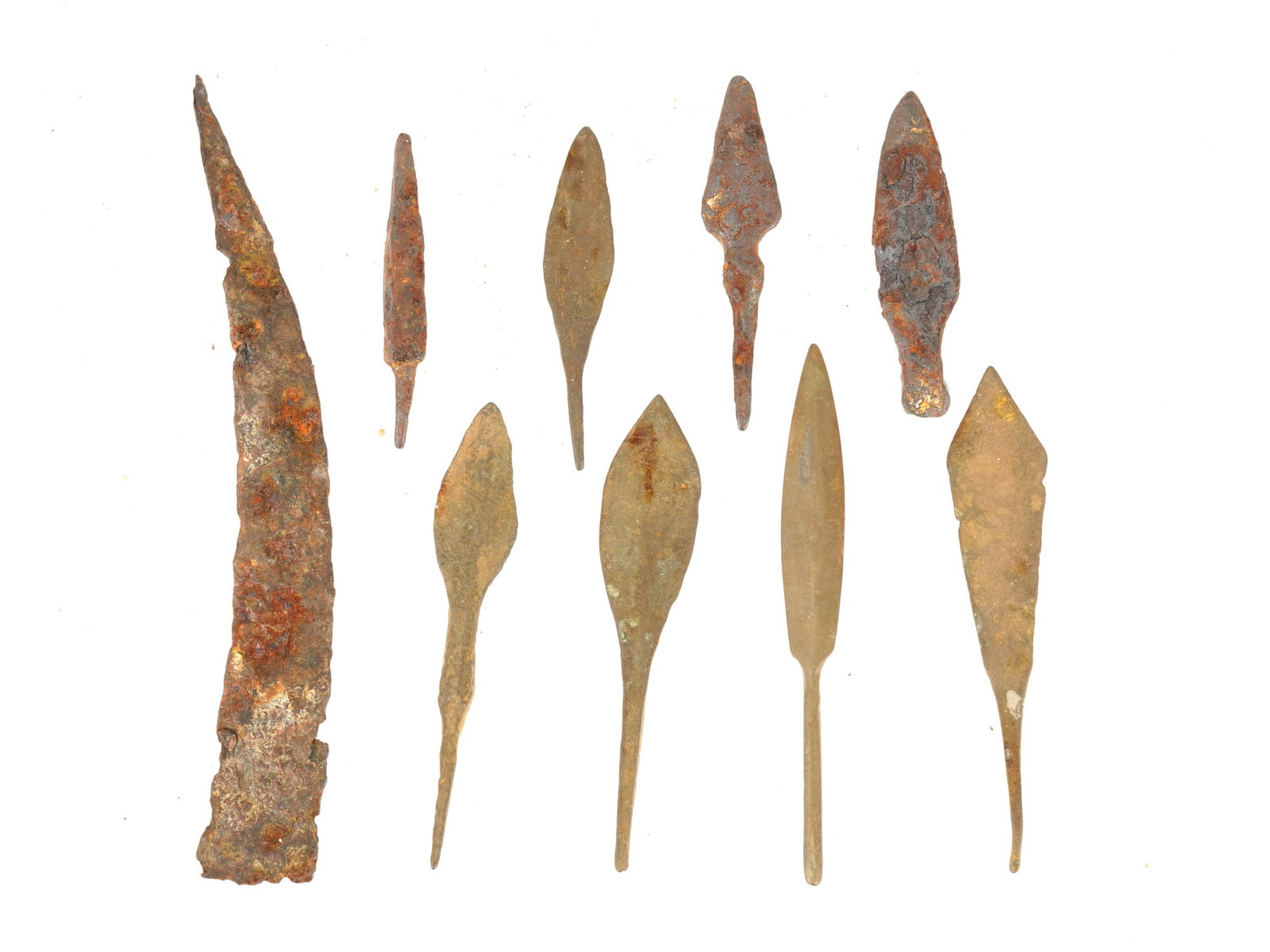 ANCIENT GRECO ROMAN IRON AND BRONZE ARROWHEADS: A group of nine ancient Greco Roman iron and bronze arrowheads of various sizes and shapes. Circa: 300 BC to 300 AD. Archaeological Finds And Historical Relics, Metalwork, Weaponry And Armor. T