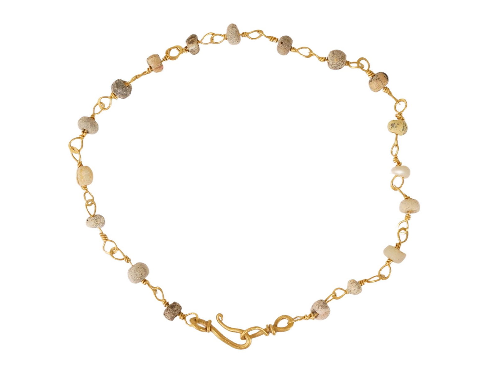 ANCIENT ROMAN HIGH CARAT GOLD AND GLASS BEADED BRACELET: An ancient Roman bracelet, dating circa 100 to 300 AD. Composed of high-carat gold elements and glass beads, reflecting the refined jewelry traditions of the Roman world. Ancient Artifacts And Histori
