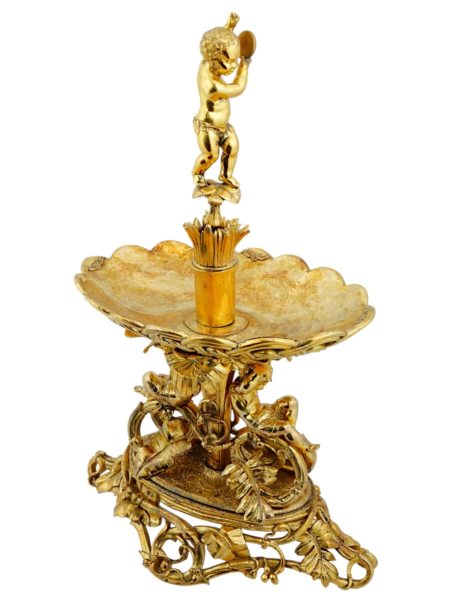 FRENCH ORIENTALIST MANNER GILT BRONZE CENTERPIECE: A French Orientalist manner gold patinated bronze centerpiece. The ware is adorned with a multi tiered design with a central fluted column and a scalloped, lattice work bowl with a scalloped edge. The