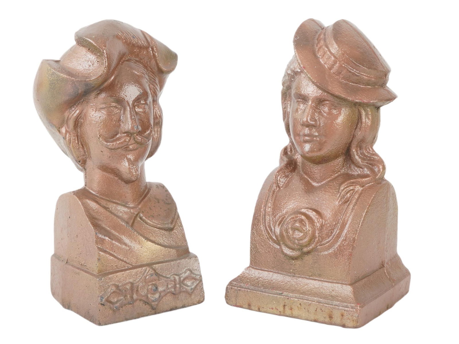 ANTIQUE FRENCH CAST IRON FIREPLACE ANDIRONS FIRE DOGS: A pair of antique French cast iron fireplace andirons, or fire dogs, each fashioned in the form of a finely detailed bust. One depicts a man, often identified as a musketeer or Spanish conquistador, a