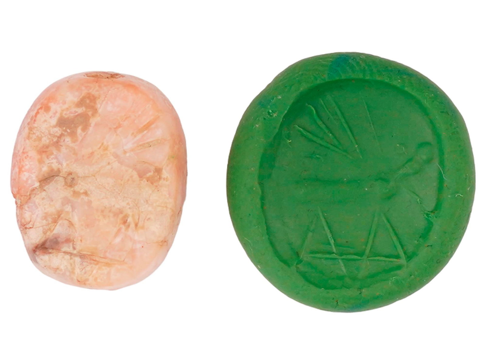 ANCIENT NEAR EASTERN AGATE SCARAB WITH ENGRAVED MOTIF: An ancient Near Eastern agate scarab, dating from the 2nd to 1st millennium BC, carved with an engraved animal motif on the underside. Such scarabs were commonly used as seals or amulets, reflecting b