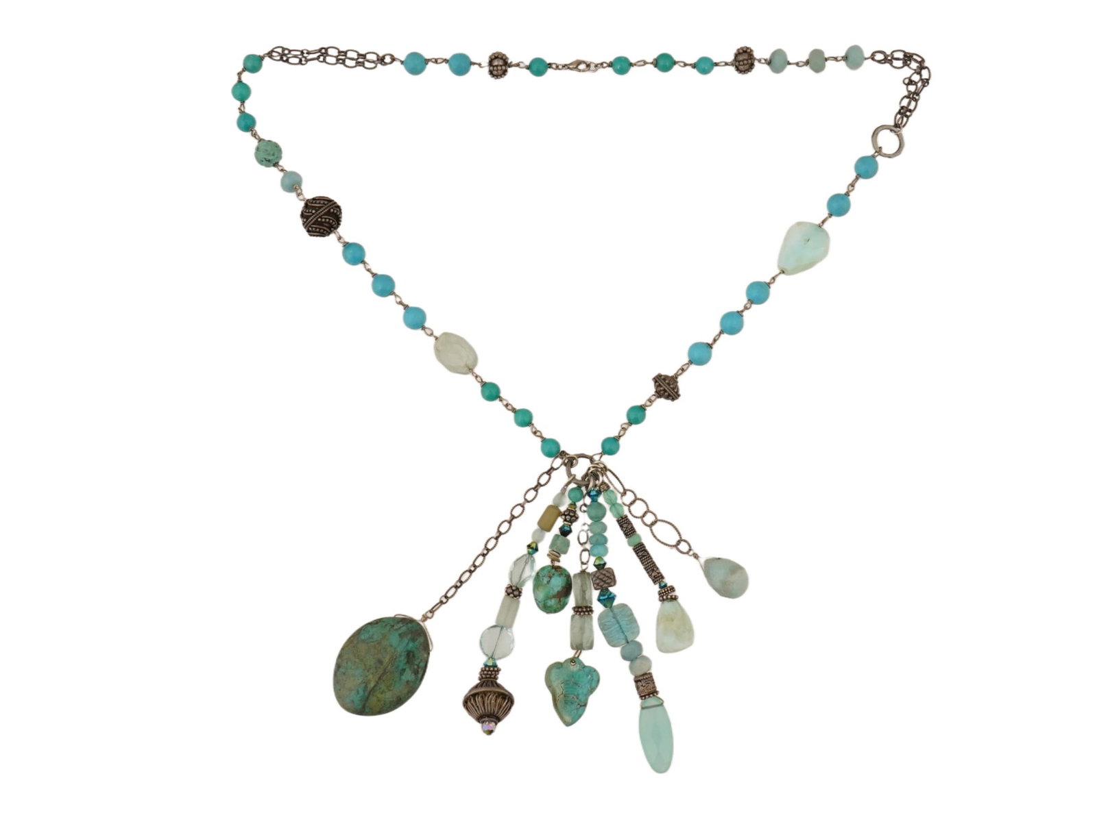 VINTAGE ETHNIC METAL TURQUOISE TASSEL NECKLACE: A vintage ethnic metal and turquoise tassel necklace. The necklace features a metal chain and alternating decorative elements, including turquoise, and a tassel with turquoise-studded pendants at the