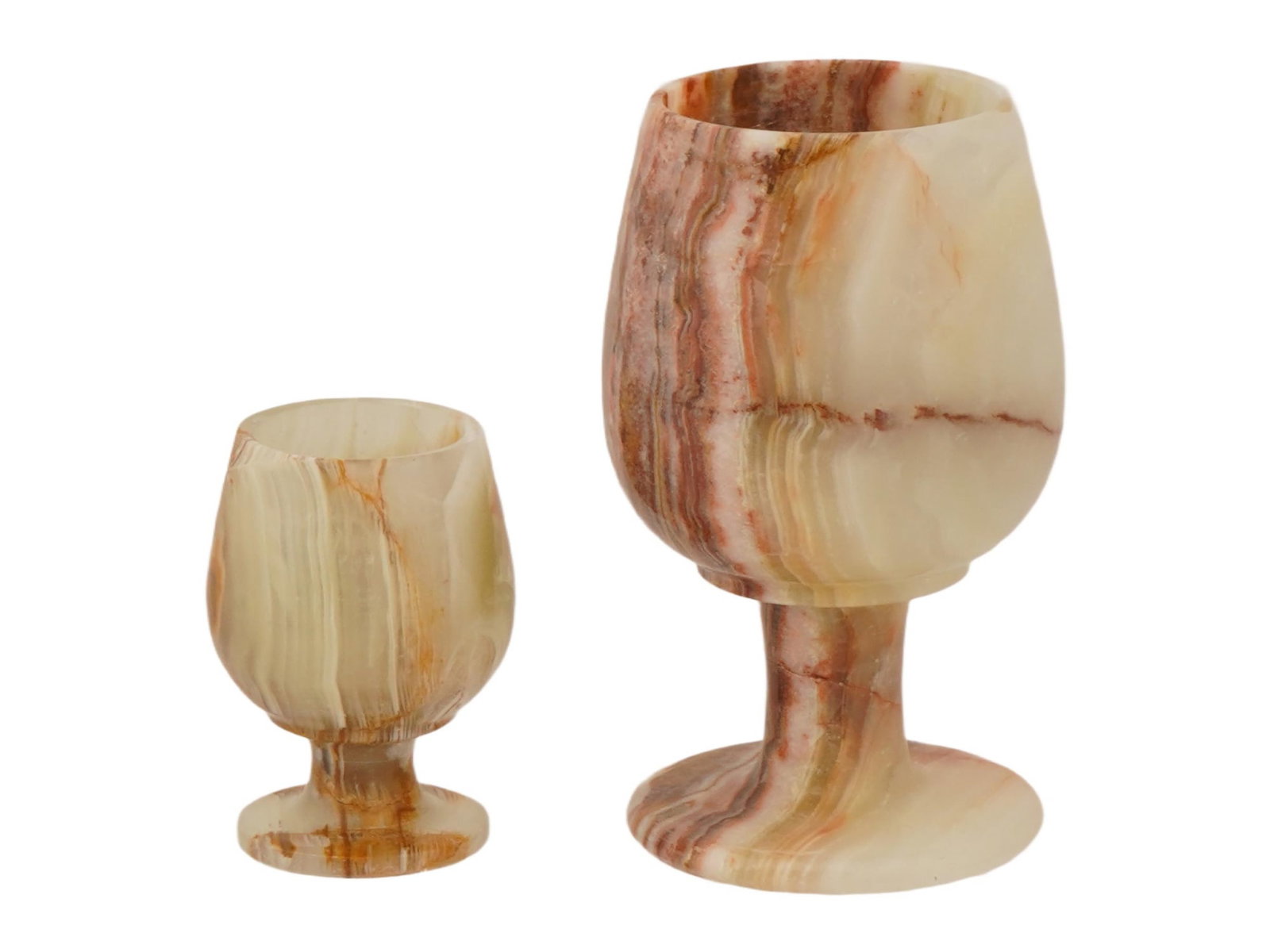 PAIR OF VINTAGE CARVED ONYX FOOTED CUPS: A pair of vintage carved onyx footed cups or goblets of various size. Mineral Stone Carvings, Tableware And Decor. THIS LOT IS ELIGIBLE FOR A 30-DAY UNCONDITIONAL RETURN FROM THE DATE OF THE S
