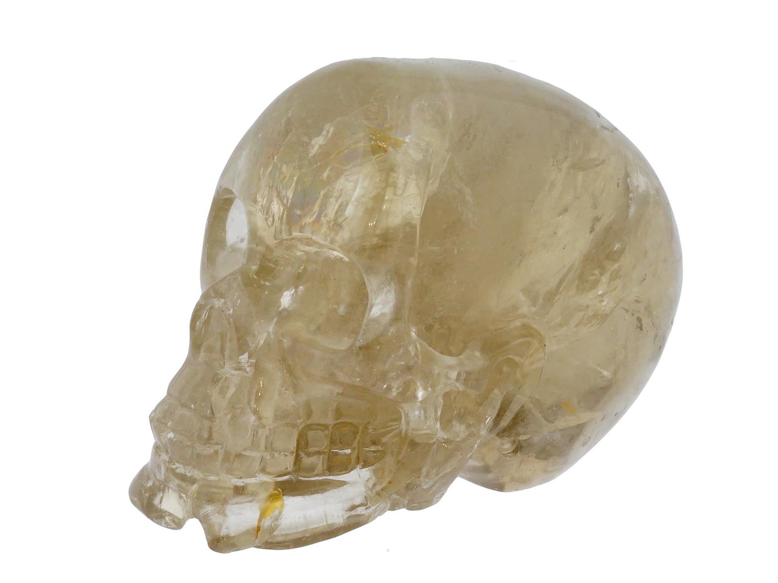 HAND CARVED QUARTZ STONE SCULL DECORATIVE FIGURINE: A figurine depicting a scull carved from natural Quartz. Hand carved with a high degree of detail realistic style and subsequent polishing. Unmarked. Modernist and Contemporary Carved Natural Stone