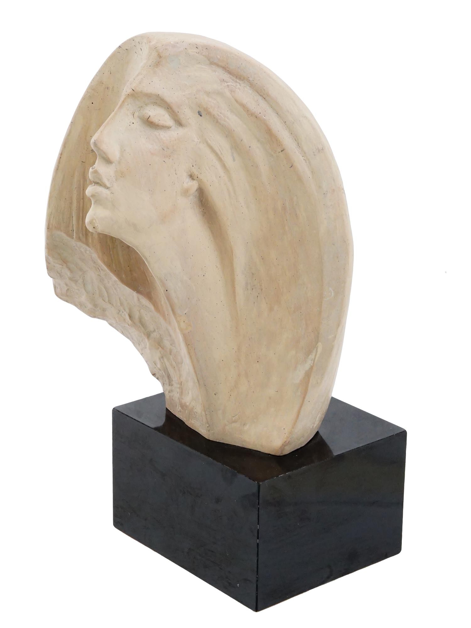 1980 SCULPTURE BY DAVID FISHER FOR AUSTIN PRODUCTIONS: A vintage sculpture titled Stargazer created by artist David Fisher for Austin Productions in 1980. A modernist bust of a woman with long, flowing hair, executed in the Art Deco style. The sculpture
