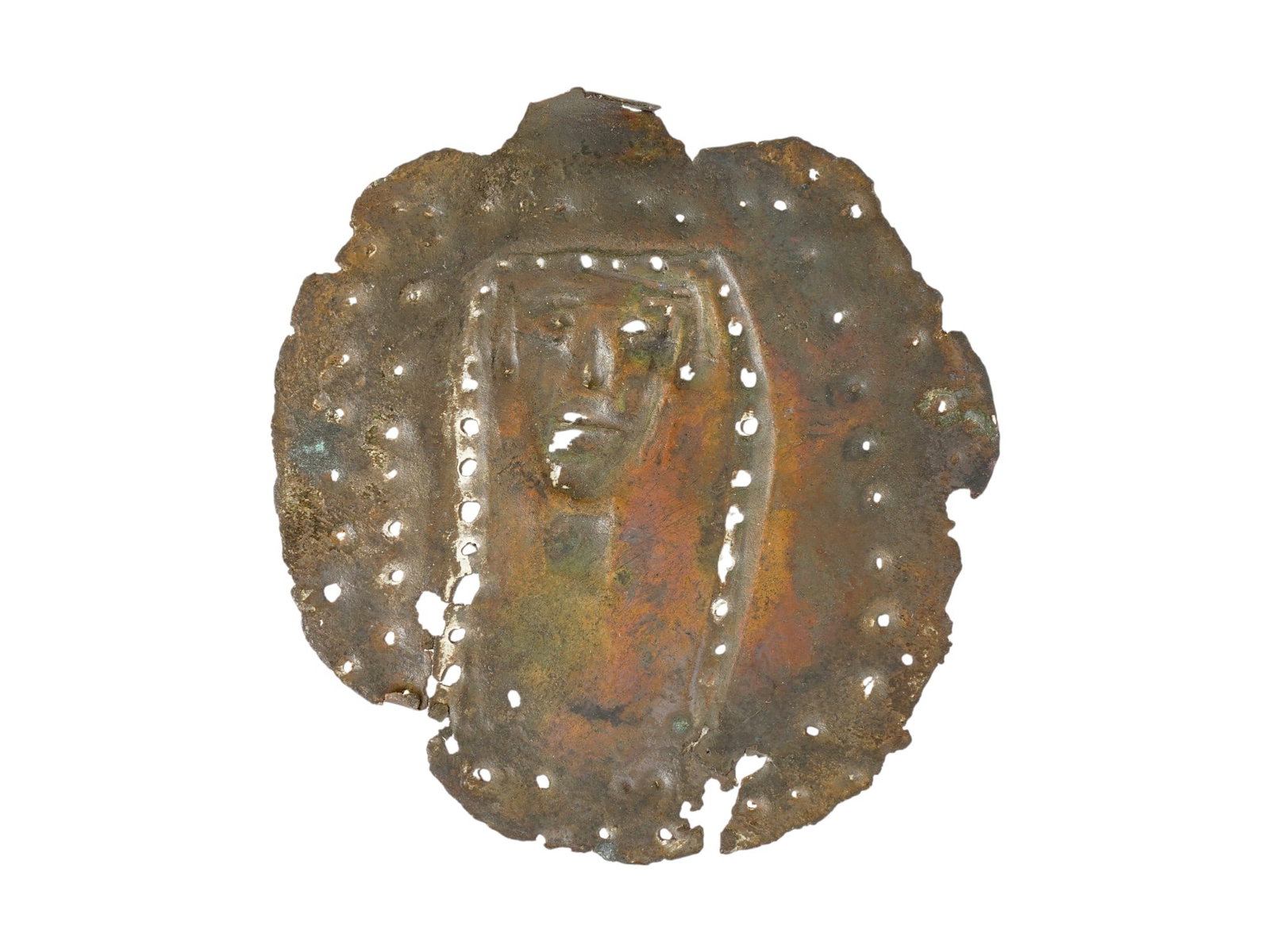 ANCIENT BYZANTINE VOTIVE BRONZE PLAQUE 400 TO 600 AD: An ancient Byzantine Empire votive bronze plaque depicting a portrait of Jesus in Egypt Coptic. Circa: 400 to 600 AD. Numerous openings are visible along the edges of the mask, which could have been u