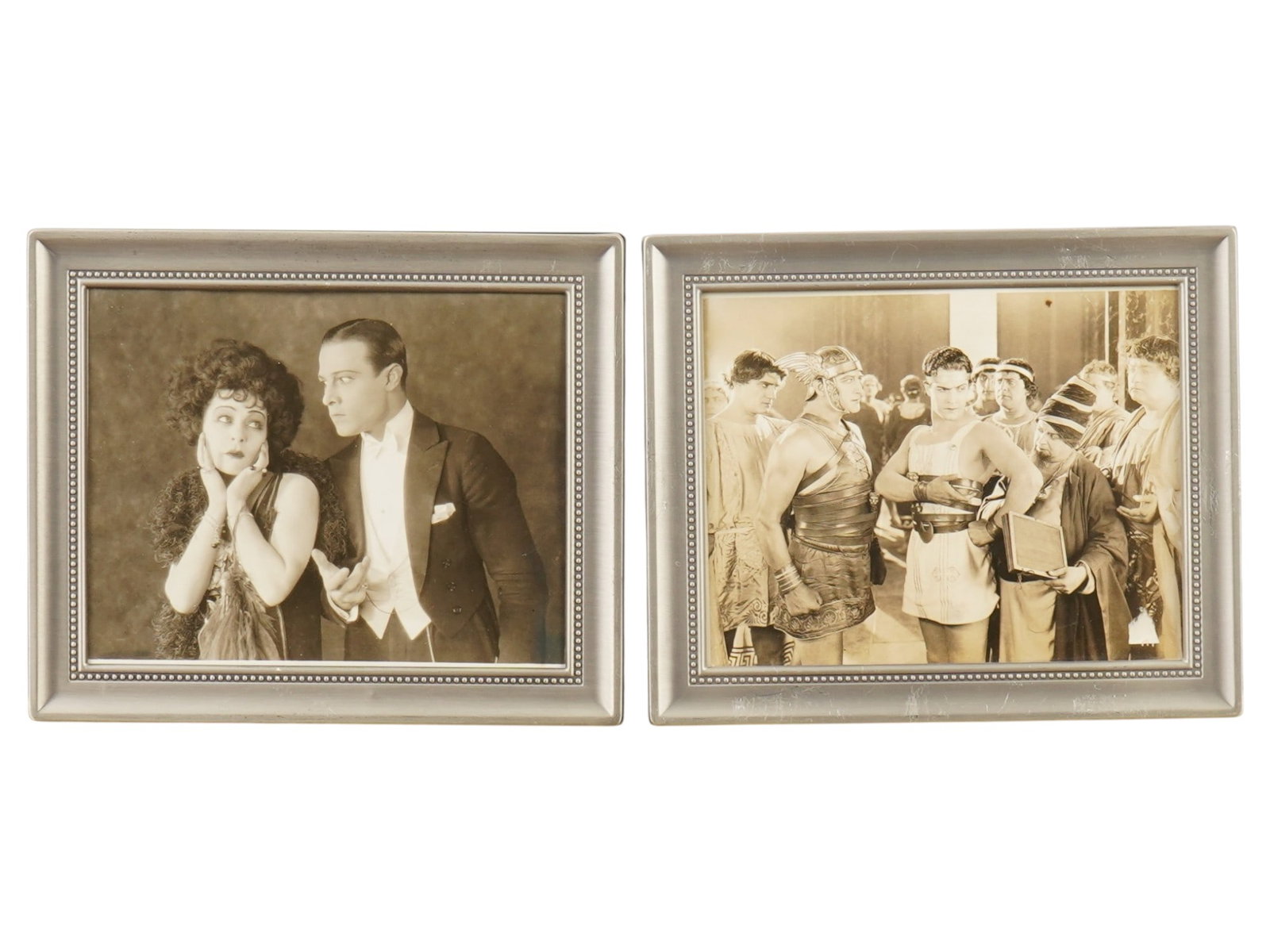 LOT OF TWO ANTIQUE PROMOTIONAL MOVIE PHOTOGRAPHS: A lot of two antique promotional photographs from two of the most significant films of the silent era during the 1920s. The first photo from Camille, 1921, features Alla Nazimova as Marguerite