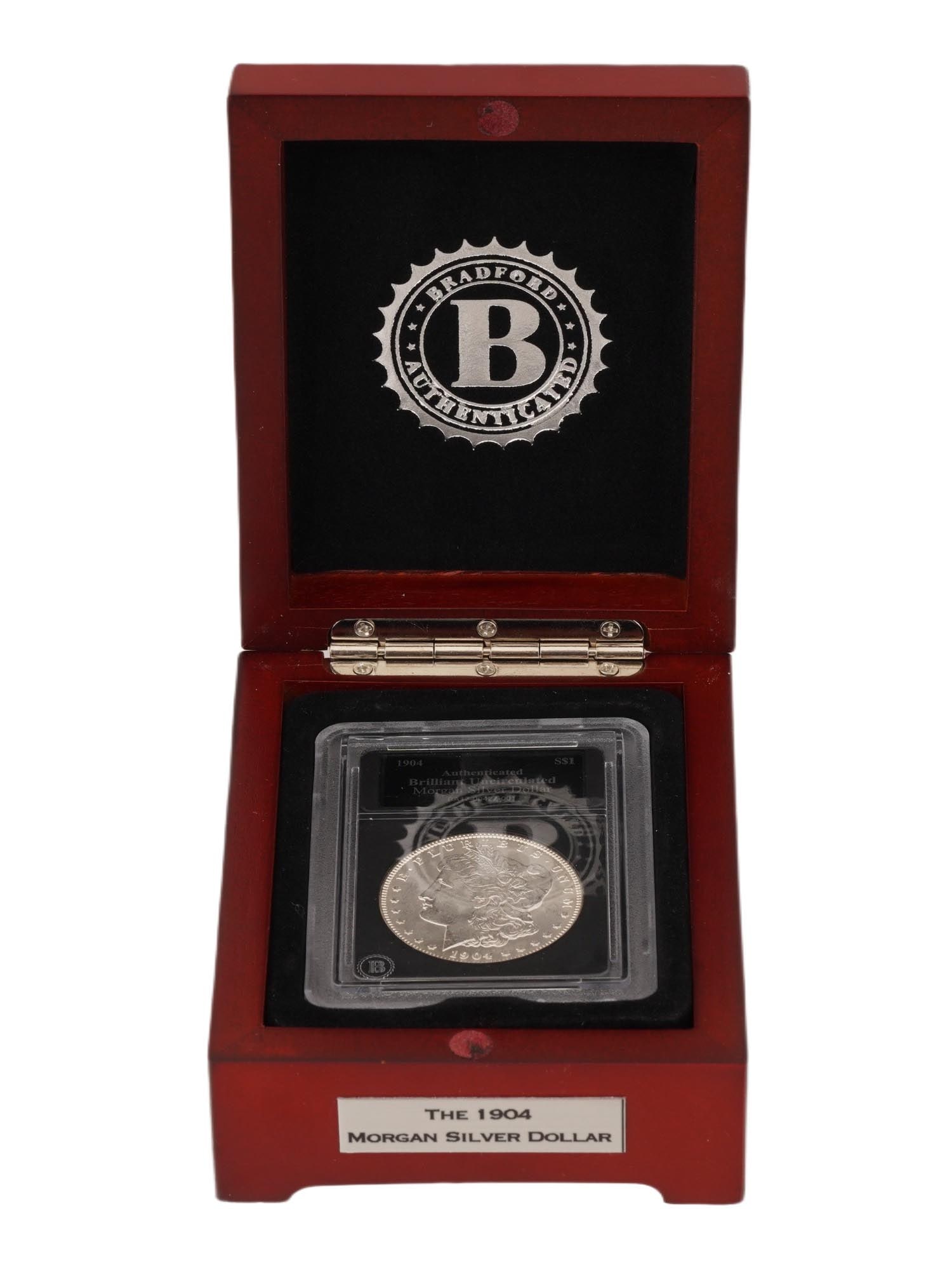 ANTIQUE 1904 GRADED UNCIRCULATED MORGAN SILVER DOLLAR (1 of 3)