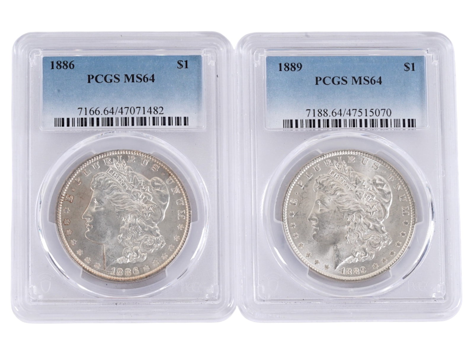 ANTIQUE AMERICAN GRADED SILVER MORGAN DOLLAR COINS: A lot of two American 1886 and 1889 silver Morgan dollars that have been professionally graded and encapsulated by the PCGS Guaranty Company. Certification Numbers: 7166.64 47071482 and 7188.64 475150