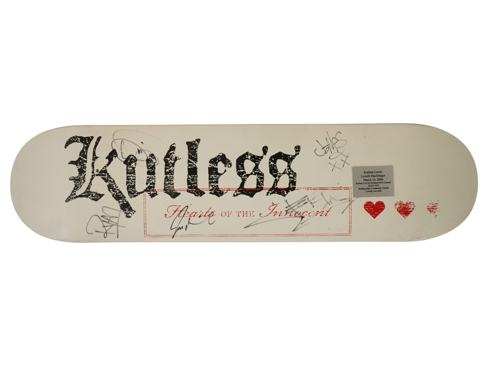 AMERICAN SKATEBOARD DECK AUTOGRAPHED BY KUTLESS: An American skateboard deck autographed by members of the Christian rock band Kutless. The item bears the inscription Hearts of the Innocent, which refers to the title of their fourth studio album, re