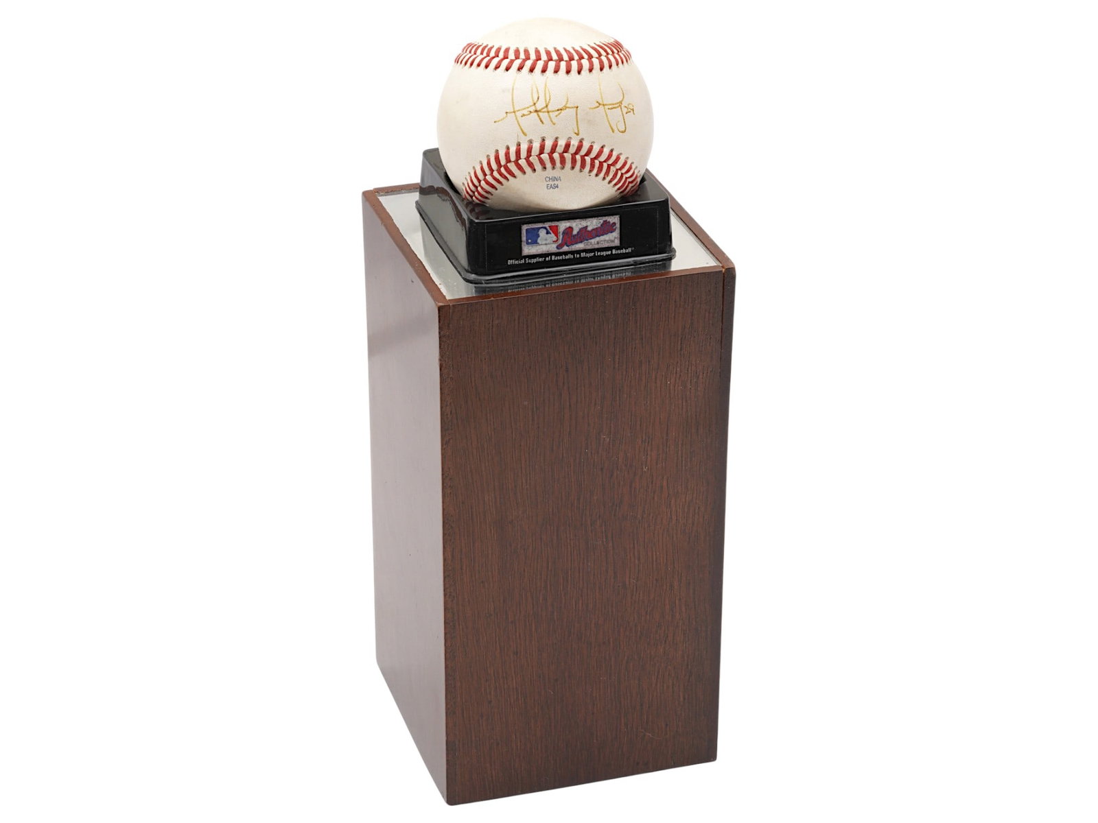 AMERICAN BASEBALL LEAGUE AUTOGRAPHED BALL WITH STAND: An American Baseball League souvenir ball autographed by the player. Marked, Rawlings. Presented with a covered case with a marked base, and a stand. American Baseball Team Sports, Memorabilia And