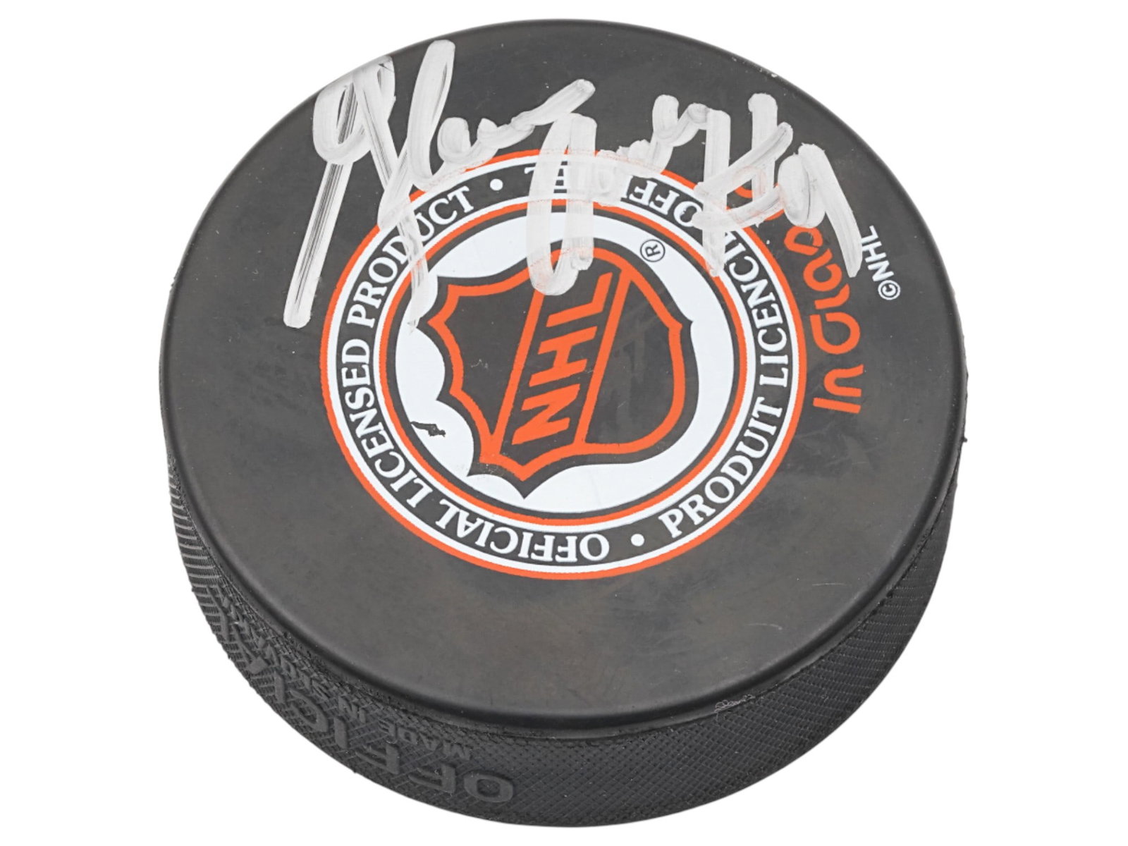 AUTOGRAPHED AMERICAN HOCKEY PUCK 2004 NHL ALL STAR GAME: An American official hockey puck of the 2004 NHL All-Star Game with autograph of a player. Venue: Xcel Energy Center, St. Paul, Minnesota. The NHL is the National Hockey League. Vintage and Modern Col