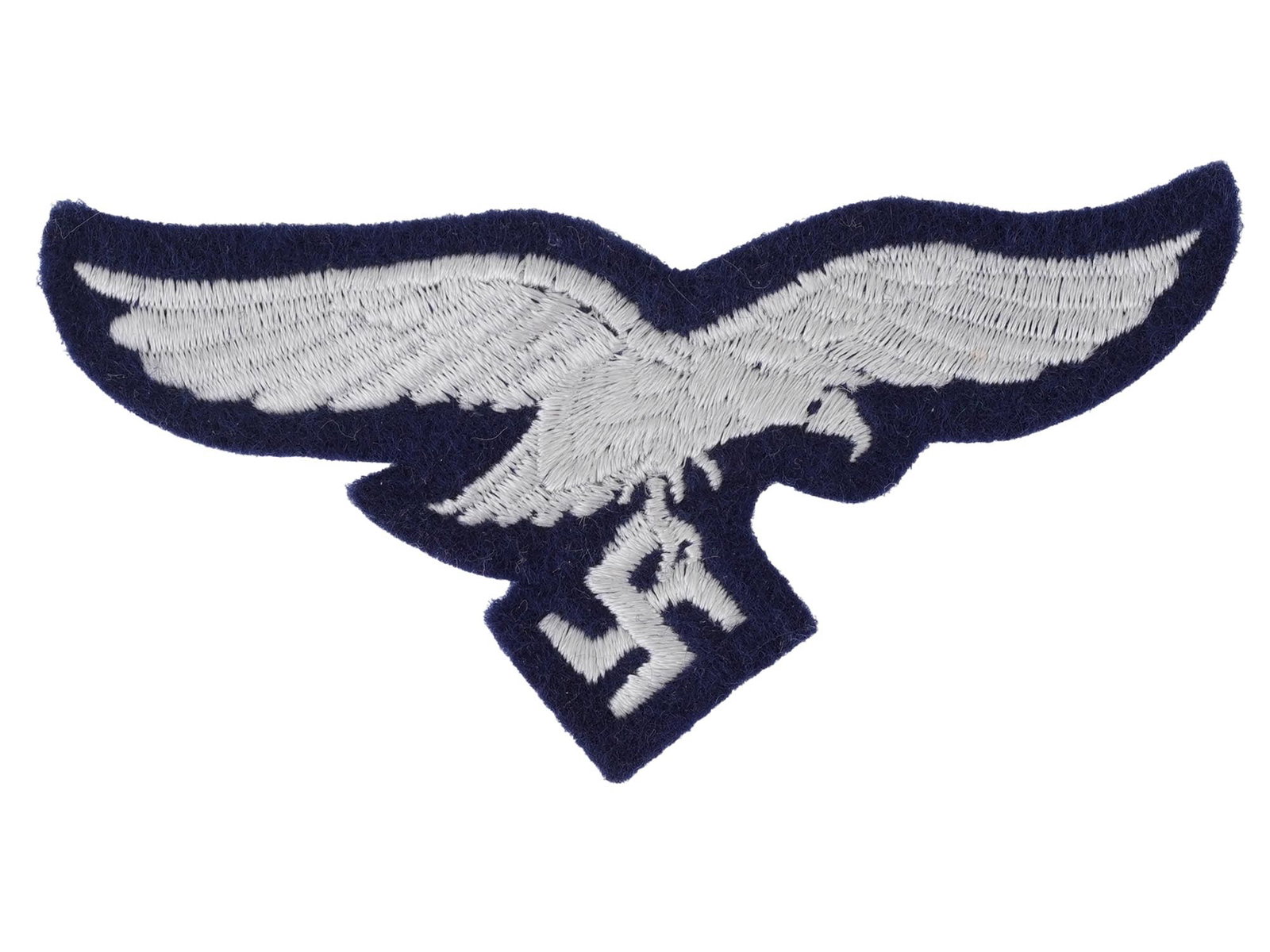 WII MODEL NAZI GERMAN LUFTWAFFE SLEEVE PATCH: A WWII model Nazi German Military insignia, a Luftwaffe sleeve patch. Eagle with swastika in dark blue and white. Second World War Historical Collectables And, Military Uniform Accessories. THI