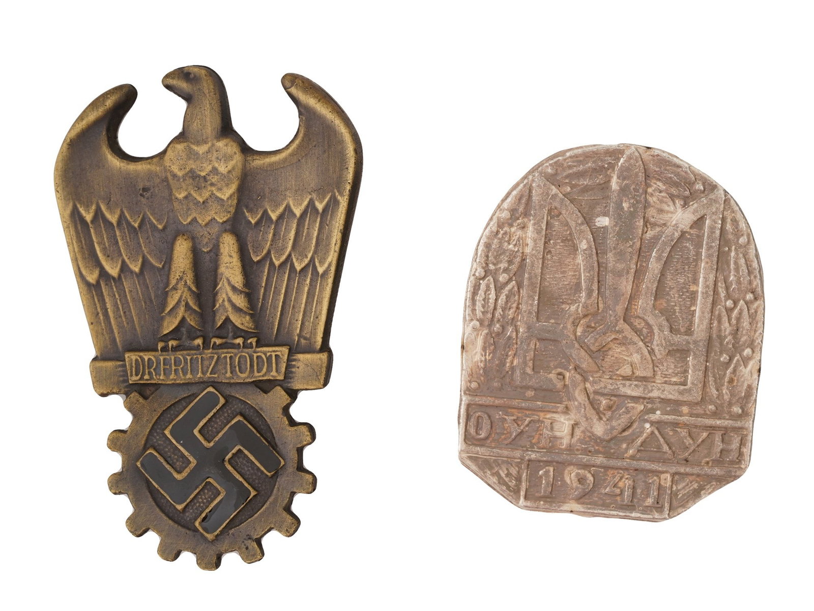 GROUP OF TWO WWII NAZI GERMAN MILITARY BADGES: A group of two WWII Nazi German military badges, including one associated with the German Labor Front and another linked to Ukrainian volunteer units aligned with German forces. Second World War Germa