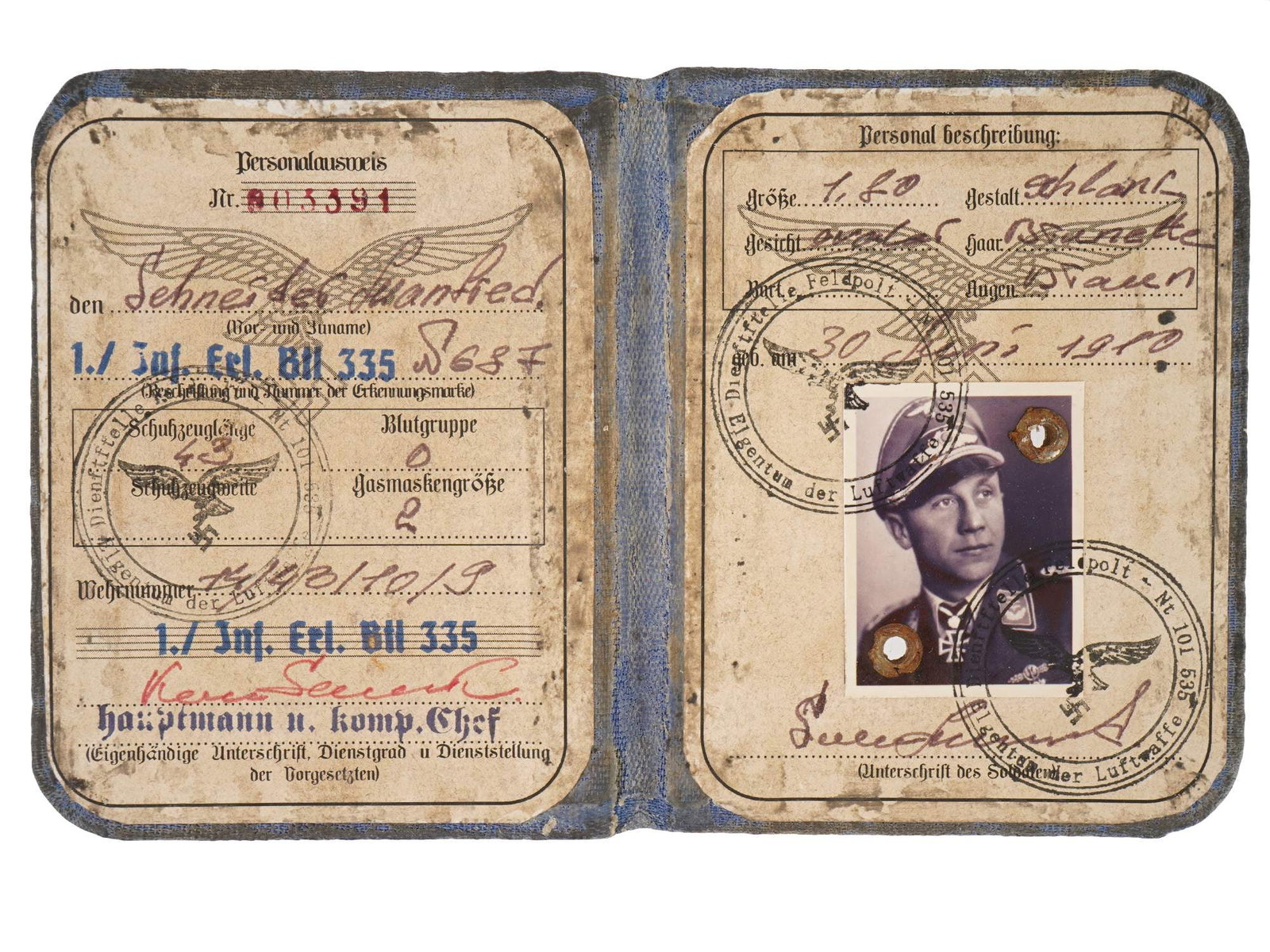 WWII NAZI GERMAN LUFTWAFFE PILOTS ID DOCUMENT AUSWEIS: A WWII Nazi German Luftwaffe pilots identification document Ausweis. Such documents were issued to air force personnel and include the bearers name, rank, photograph, and official stamps. Second World