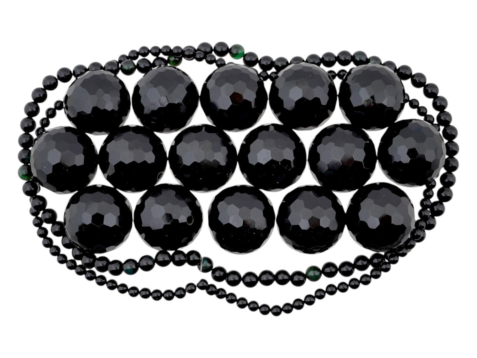 COLLECTION OF ASSORTED CARVED ONYX BEADS STRINGS: A collection of strings with assorted carved black Onyx stone manner beads. The circular shaped beads are made in various sizes. Vintage Jewelry For Women, Mineral Stones and Glass, and Accessories Fo