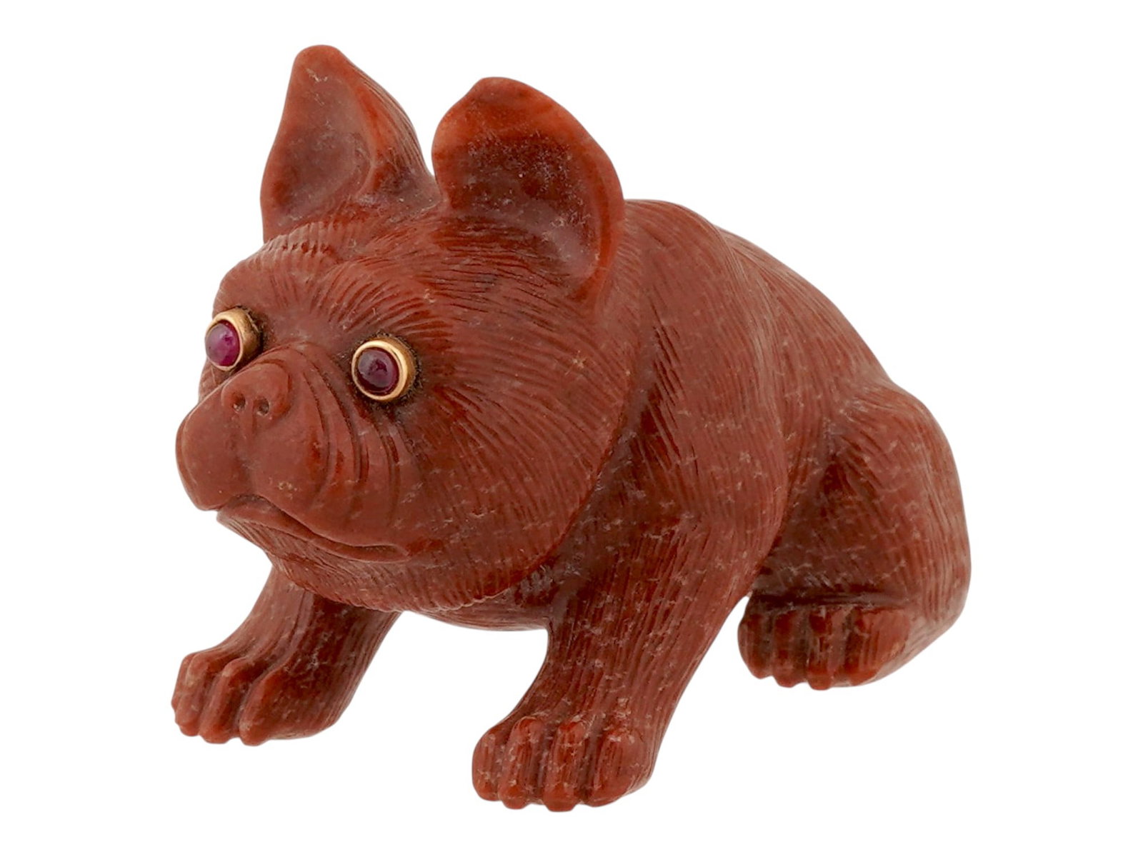 RUSSIAN JASPER BULLDOG FIGURINE W GOLD AND RUBY EYES: A Russian French bulldog figurine skillfully hand carved of natural jasper stone. The eyes are set with cabochon cut rubies in Gold settings. The figurine is well detailed and has a naturalistic desig