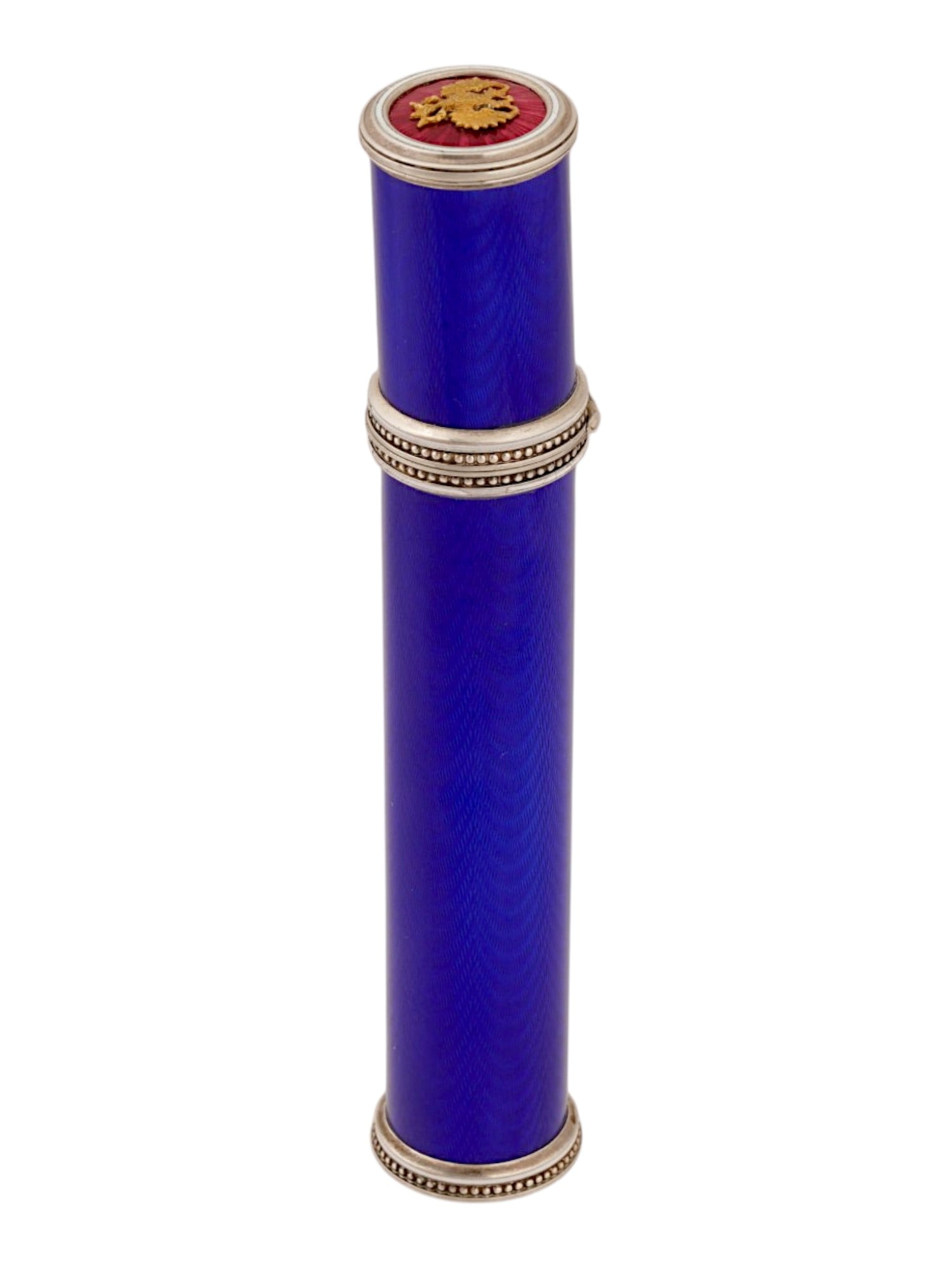 RUSSIAN IMPERIAL SILVER ENAMEL CIGAR CASE WITH AN EAGLE: A Russian gilt silver and enamel cigar case. The body of the case is covered with a cobalt blue guilloche enamel. The hinged lid features a gillouche enamel overlay depicting the Imperial