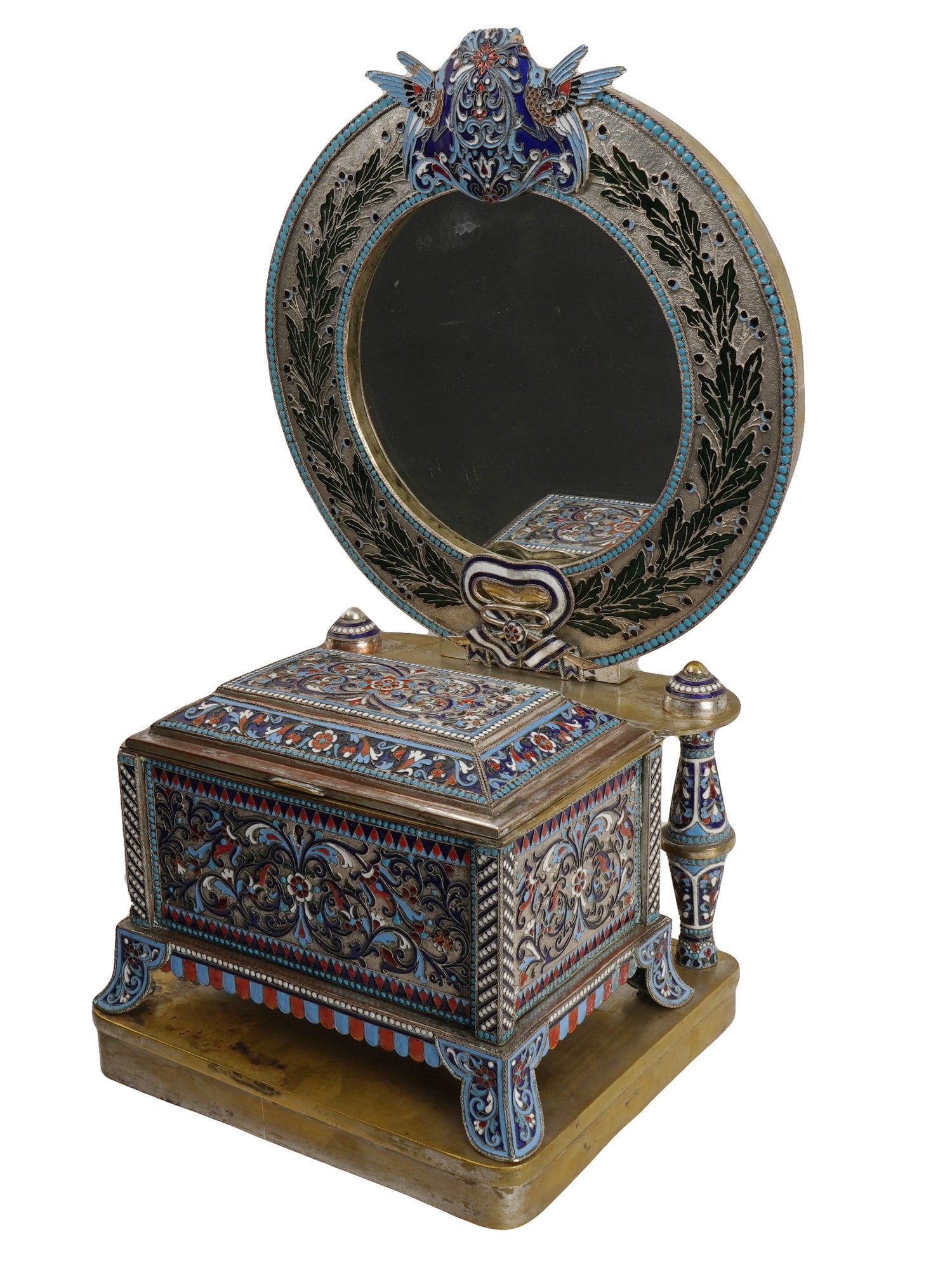 RUSSIAN SILVER CLOISONNE ENAMEL TRINKET BOX W MIRROR: A Russian silver Cloisonne enamel trinket box with mirror. The lidded box is shaped like a chest, raised on legs, and features a round mirror decorated with a foliate motif along the edge and topped w