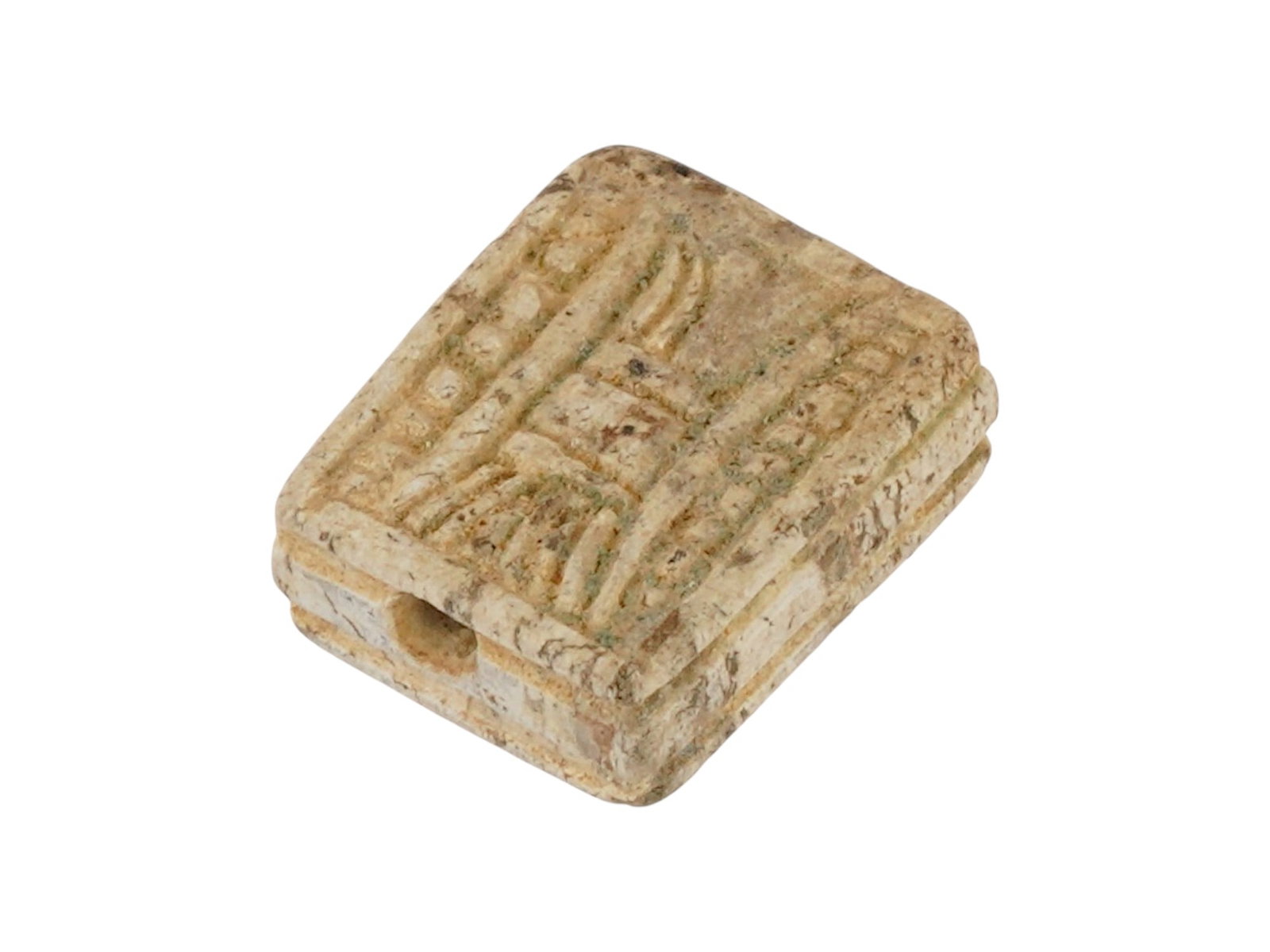 ANCIENT EGYPTIAN STEATITE BEAD ENGRAVED WITH MOTIFS: An ancient Egyptian steatite bead dating to the Late Period, circa 700 to 200 BC, carved and engraved with decorative motifs. Such beads were commonly used in necklaces or amuletic jewelry. Ancient Ar