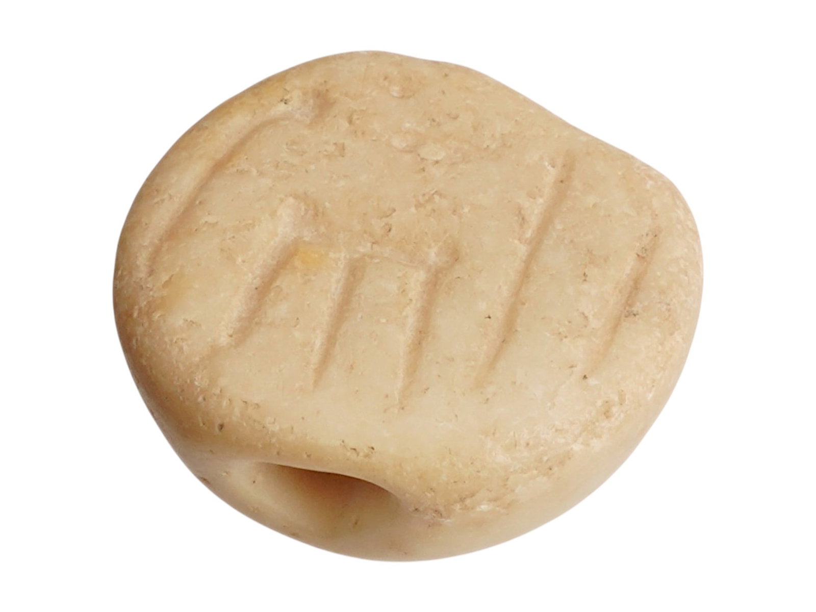 ANCIENT NEAR EASTERN MARBLE BEAD 2ND MILLENNIUM BC: An ancient Near Eastern carved marble scarab bead seal. The piece is adorned with an engraved image representing an animal in a field. Pierced through the center. Circa: the 2nd Millennium BC. Collect